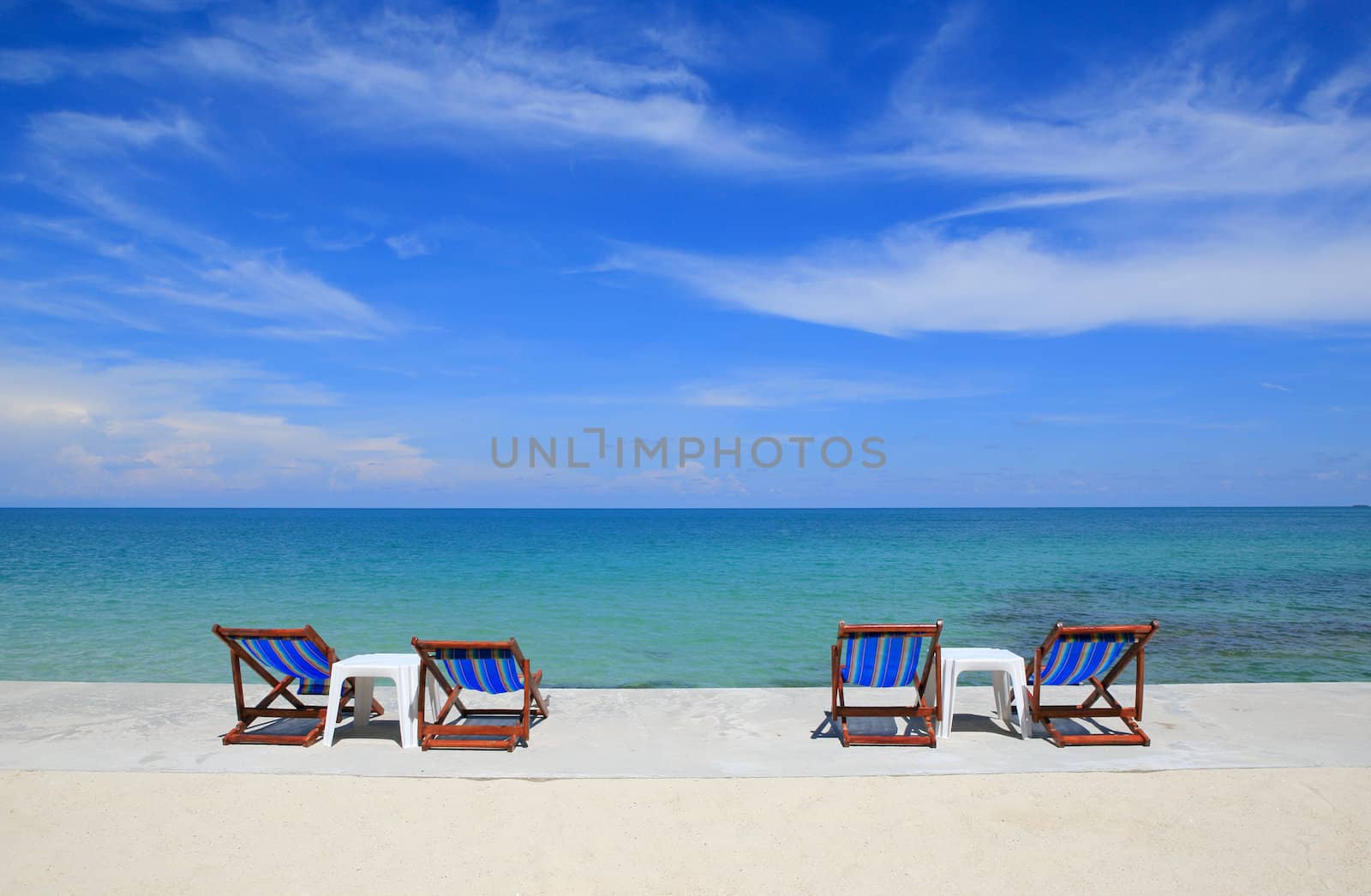 chairs on the white sand beach of Koh Samet in Rayong province, thailand