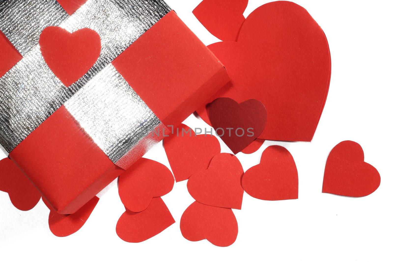 Valentines Day gift in red box and greeting card isolated on white top view