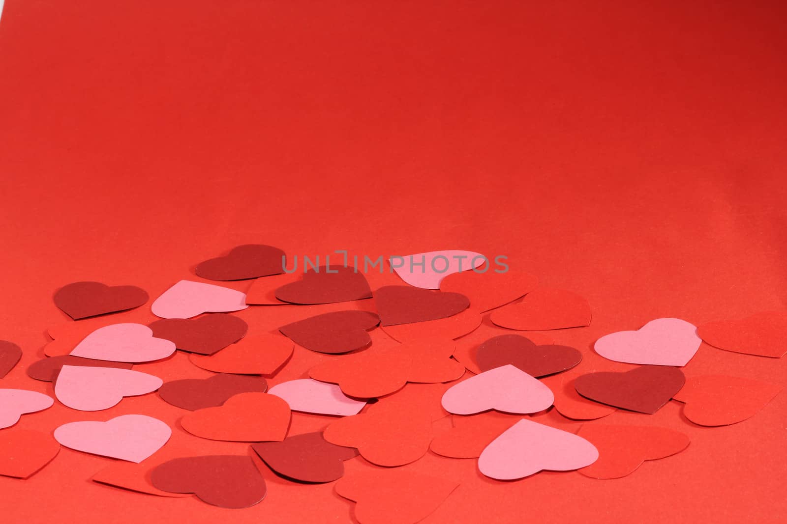 Valentines day background with many paper hearts