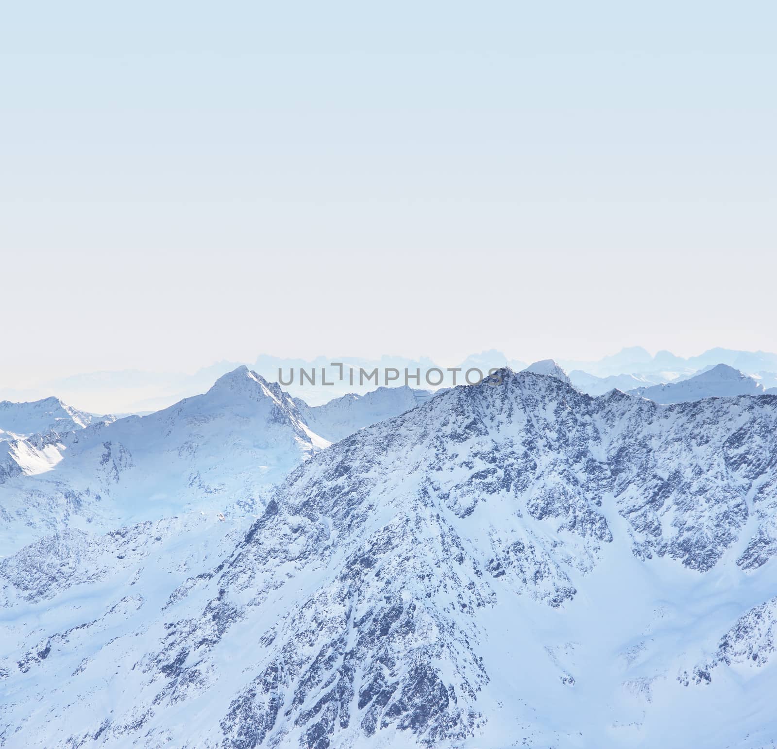 Winter alpine mountains covered with snow