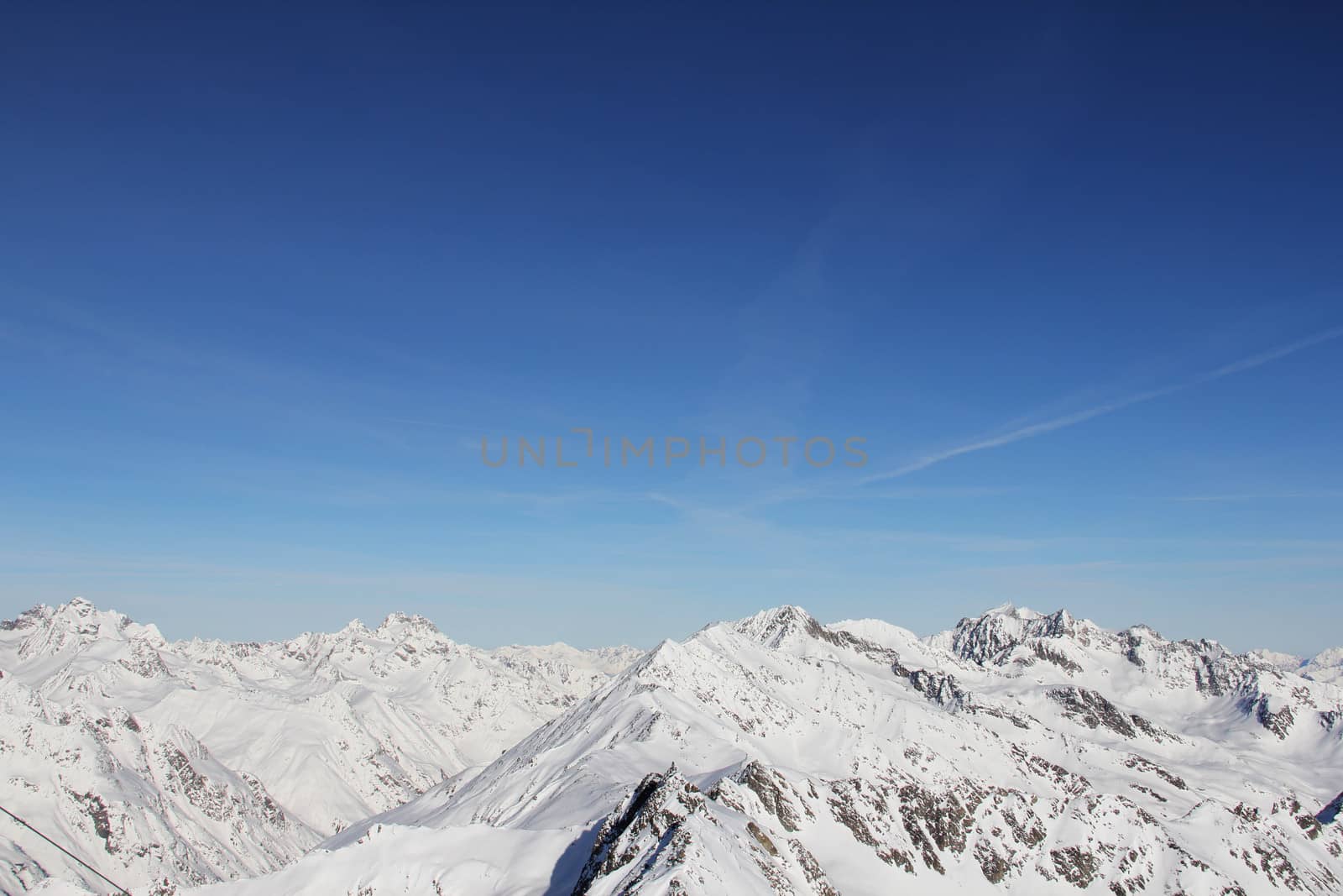 Winter alpine mountains covered with snow