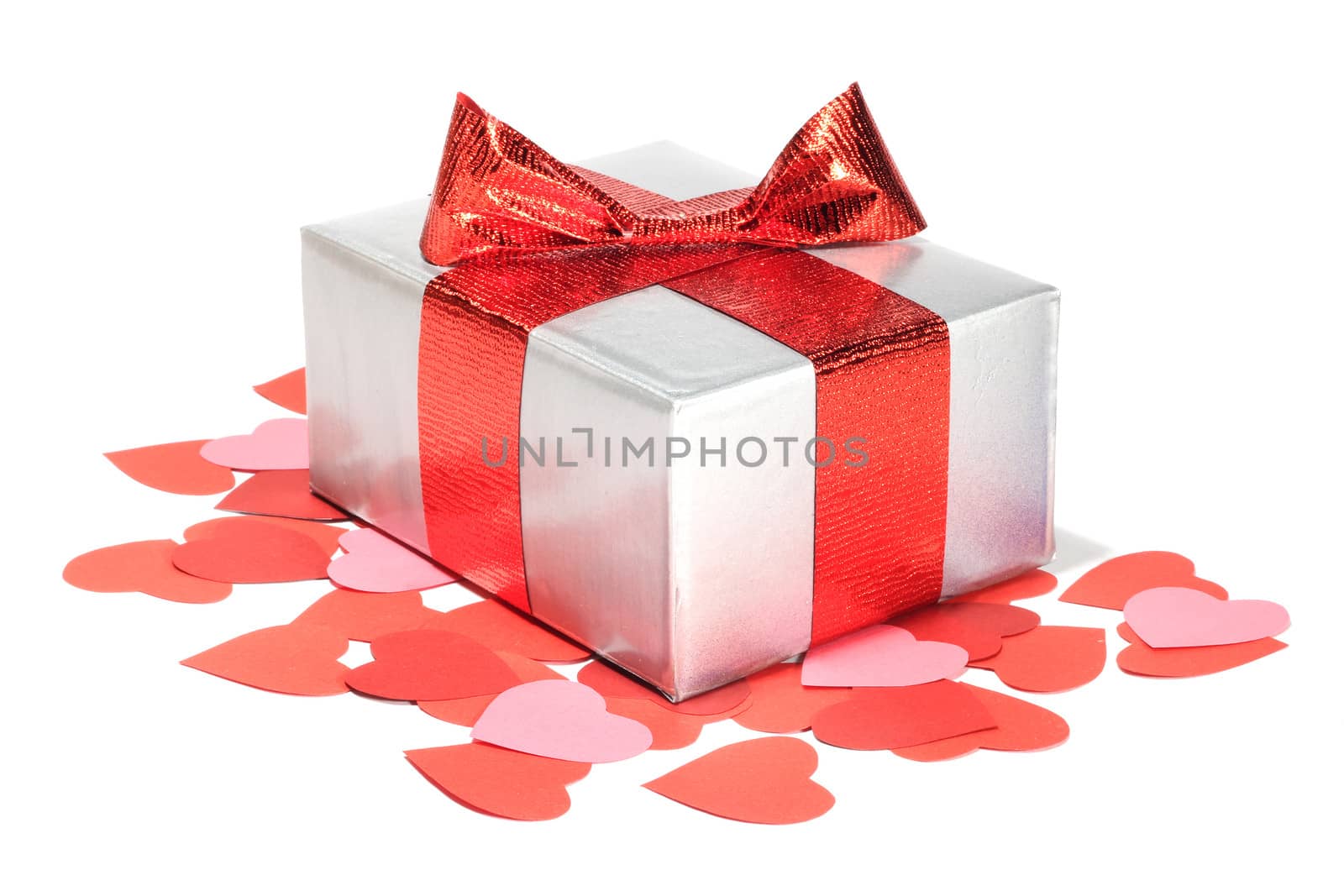 Valentines Day gift in silver box and small hearts isolated on white