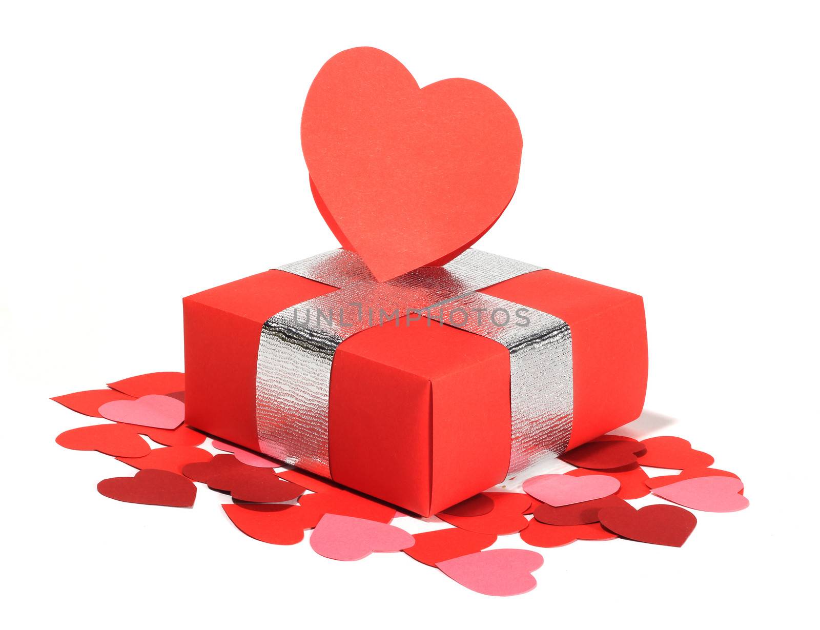 Valentines Day gift in red box and heart shaped card isolated on white