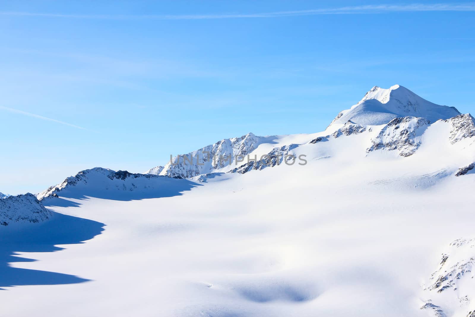 Hight mountains under blue sky beautiful winter panorama