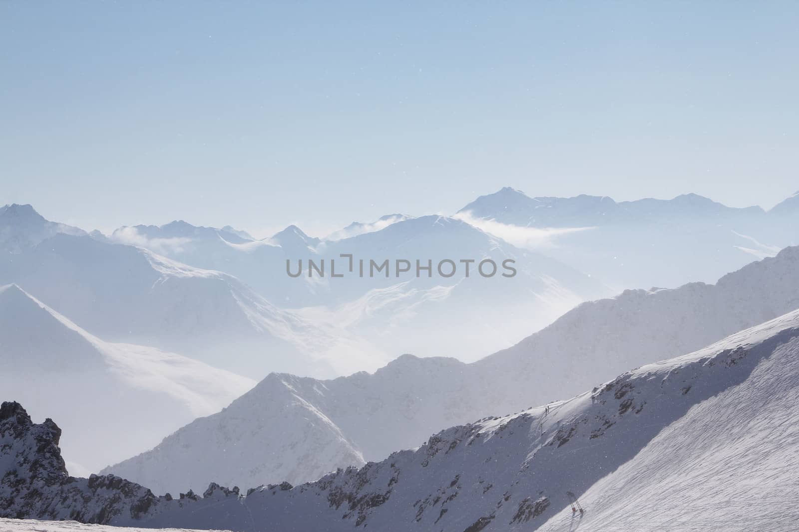 Winter alpine mountains covered with snow