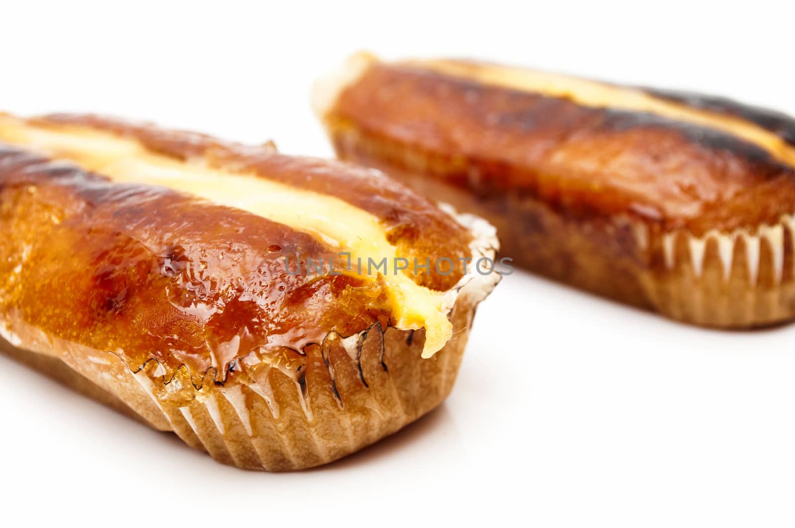 Cream cakes on a white background