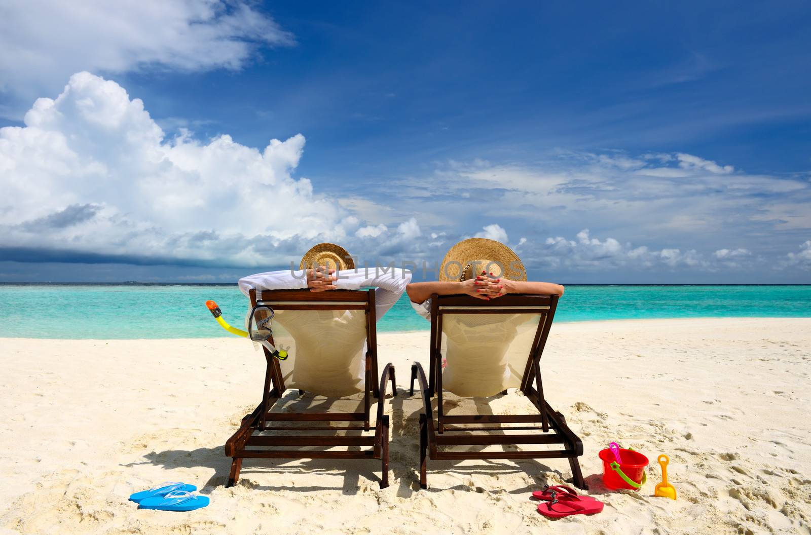 Couple on a tropical beach at Maldives