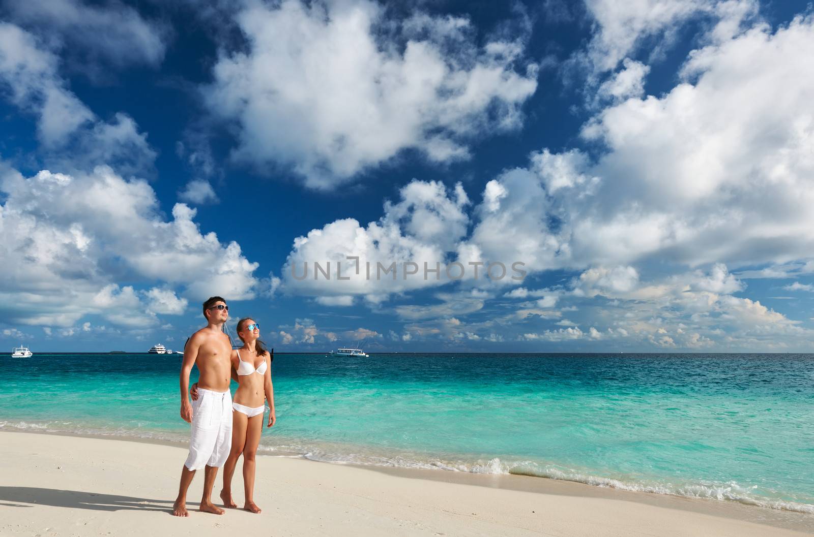 Couple on a tropical beach at Maldives