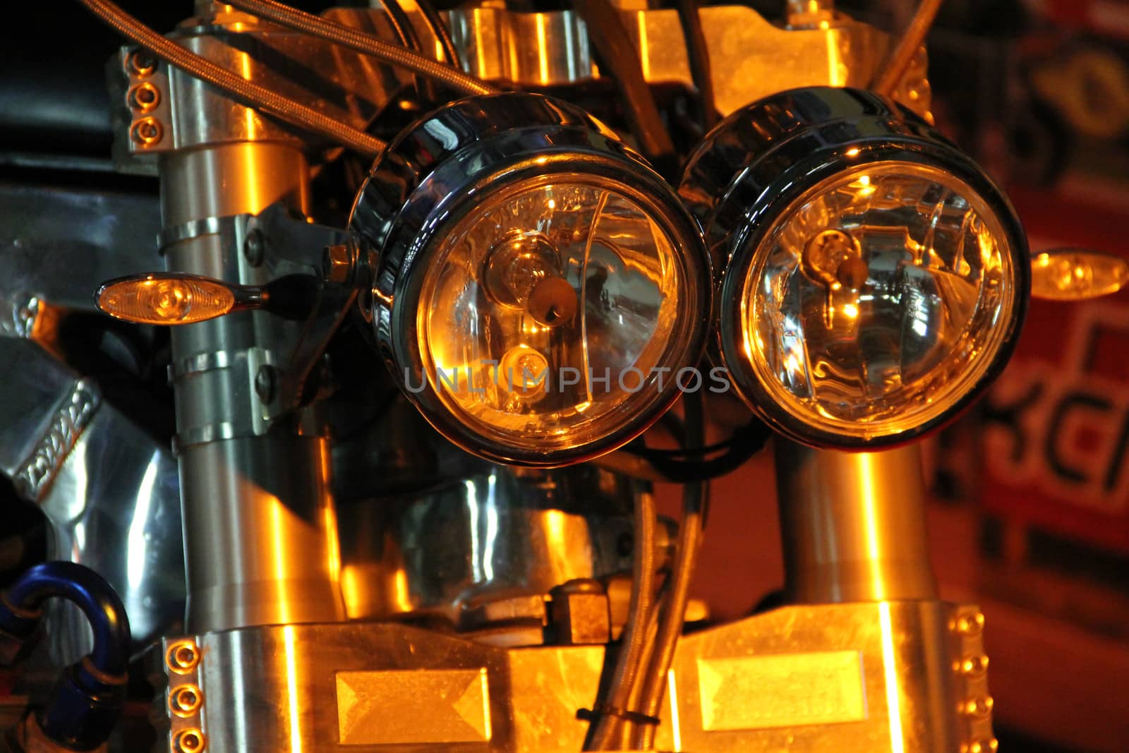 Shiny motorcycle headlight macro close up