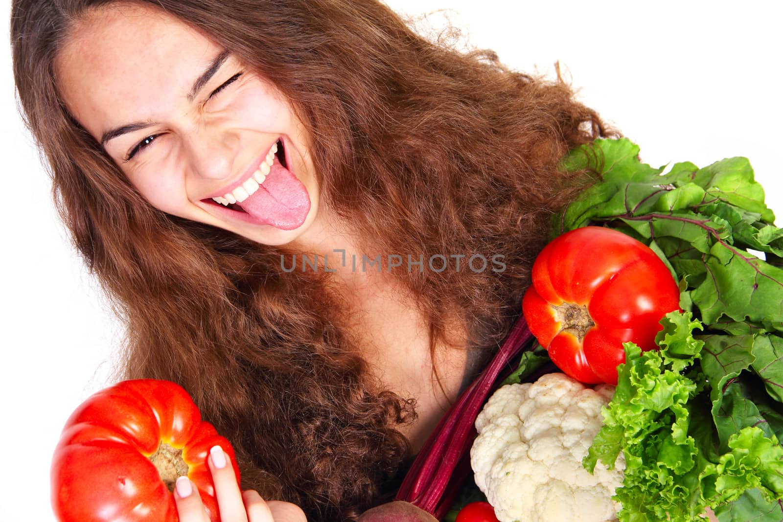 Funny girl with vegetables isolated on white background