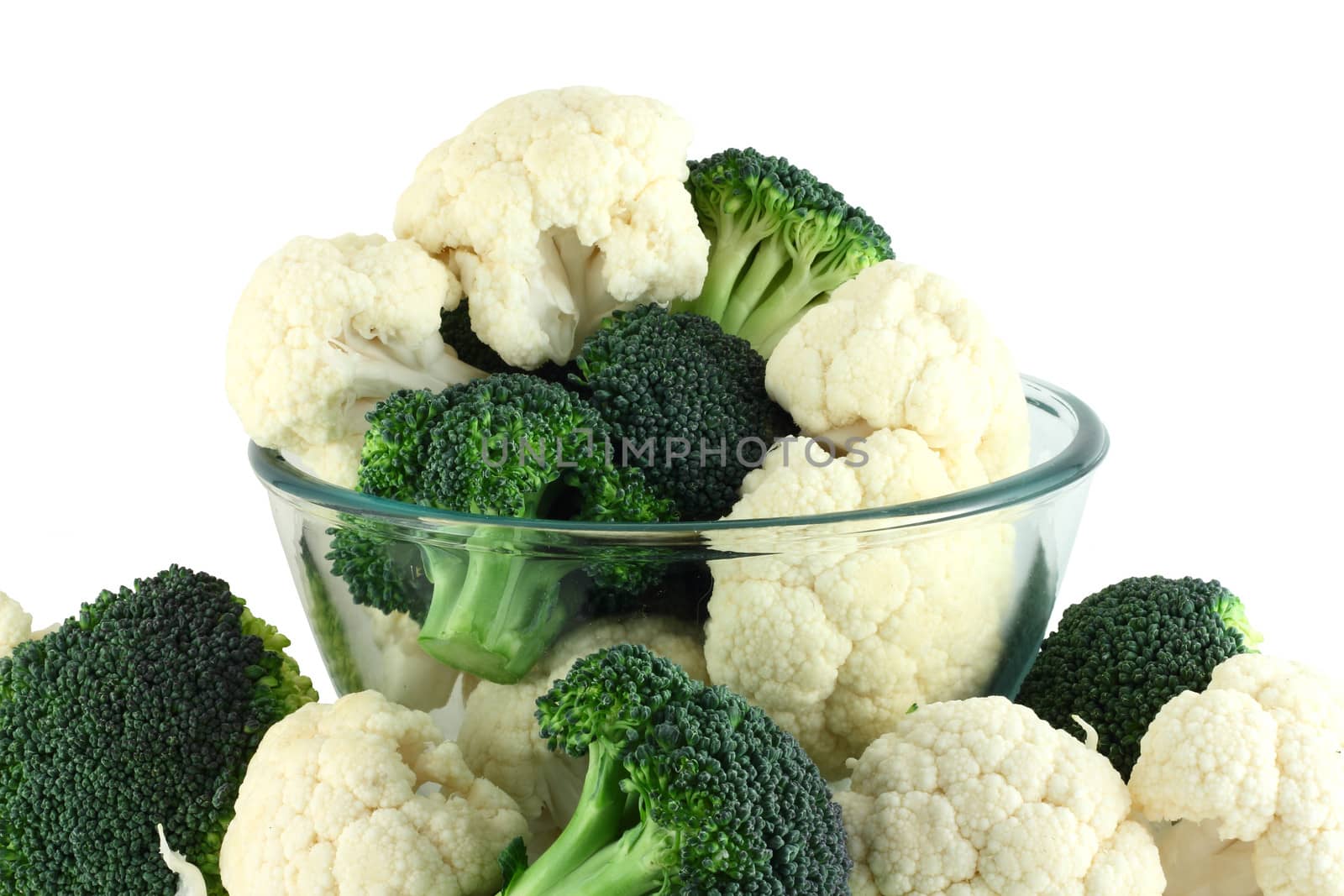 Cauliflower and broccoli in transparent bowl isolated on white