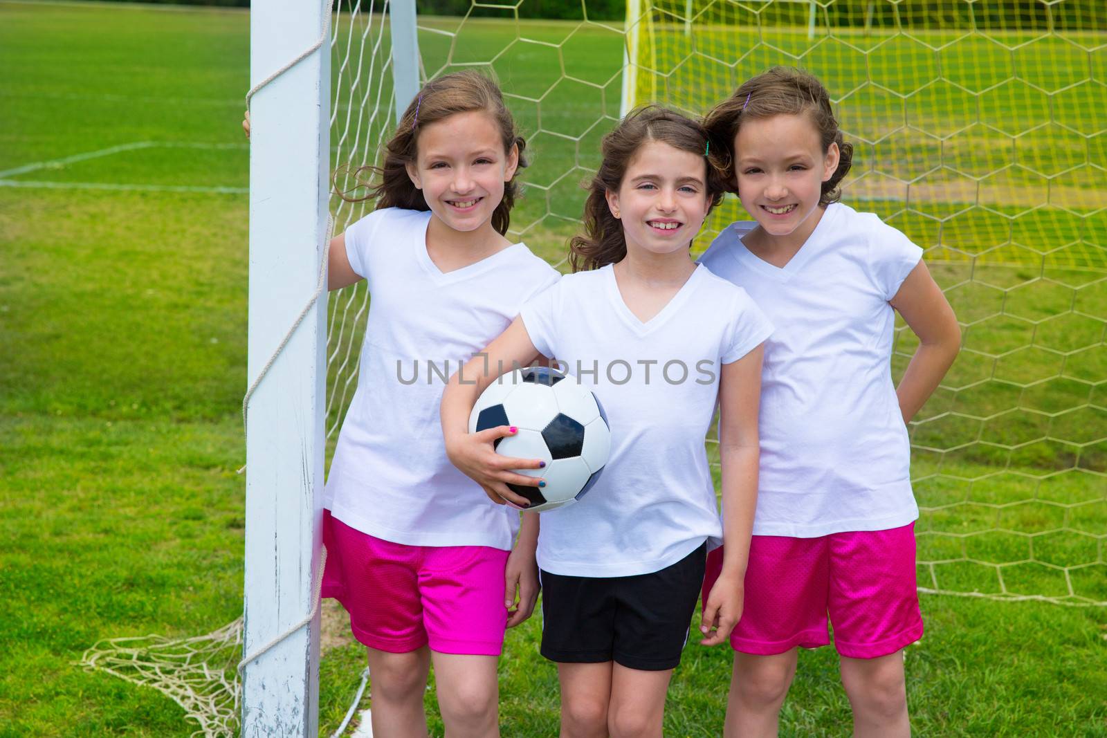 Soccer football kid girls team at sports outdoor fileld before match