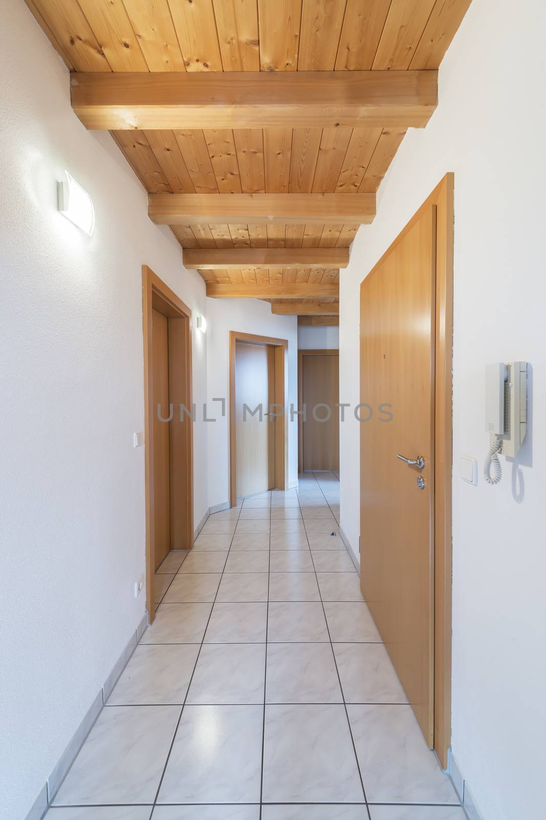 White tiled corridor in an appartment