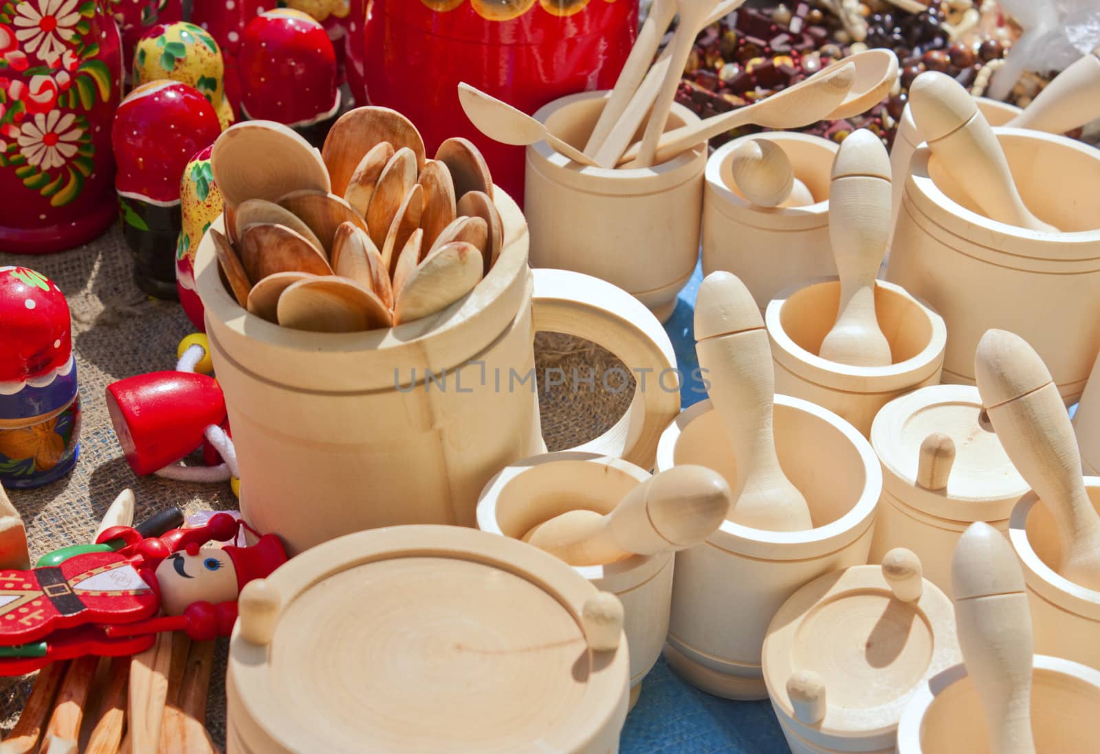 Souvenirs carved from wood cups and spoons closeup