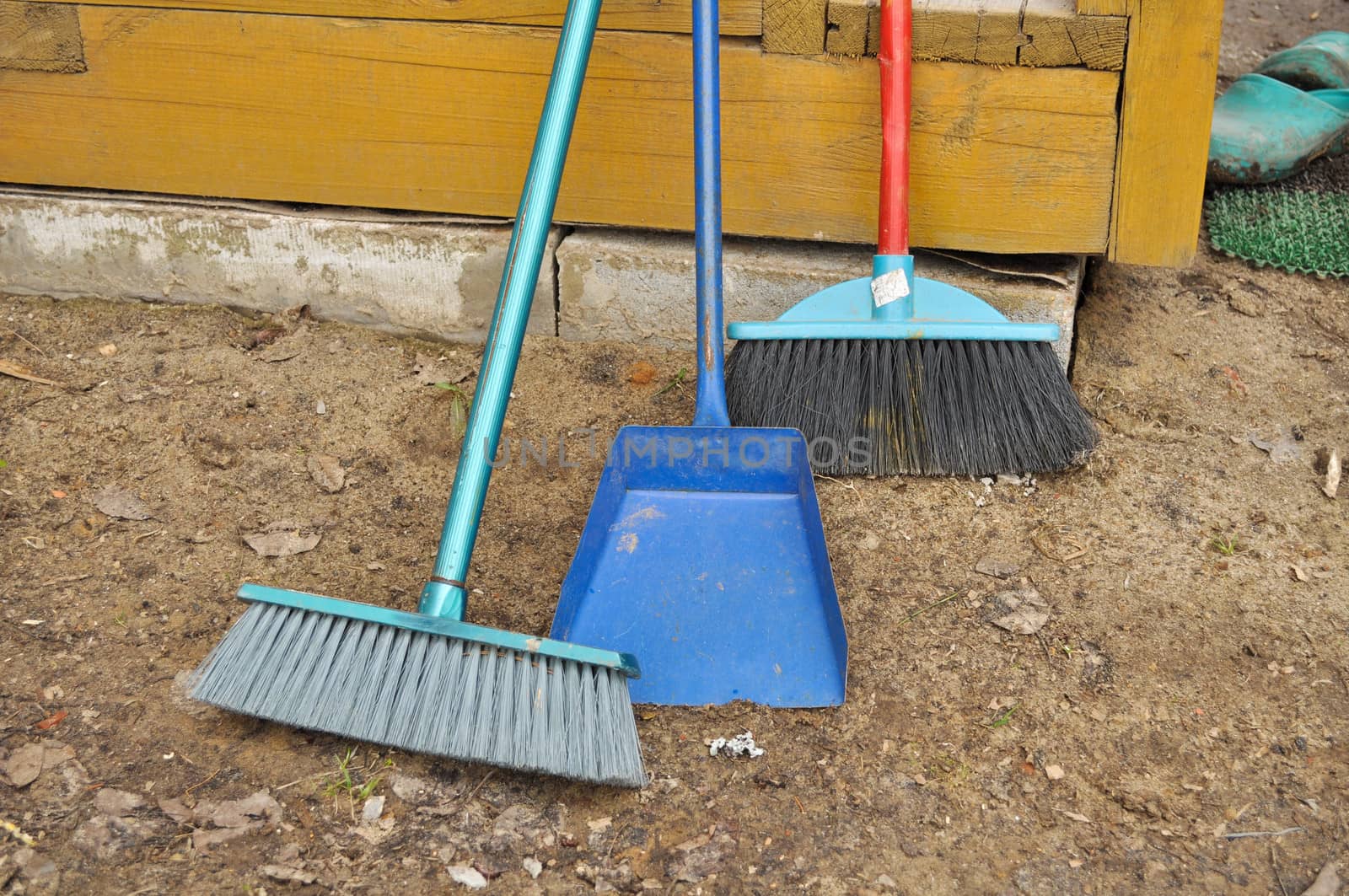 Shovel and broom. An indispensable accessory of a country cottage.
