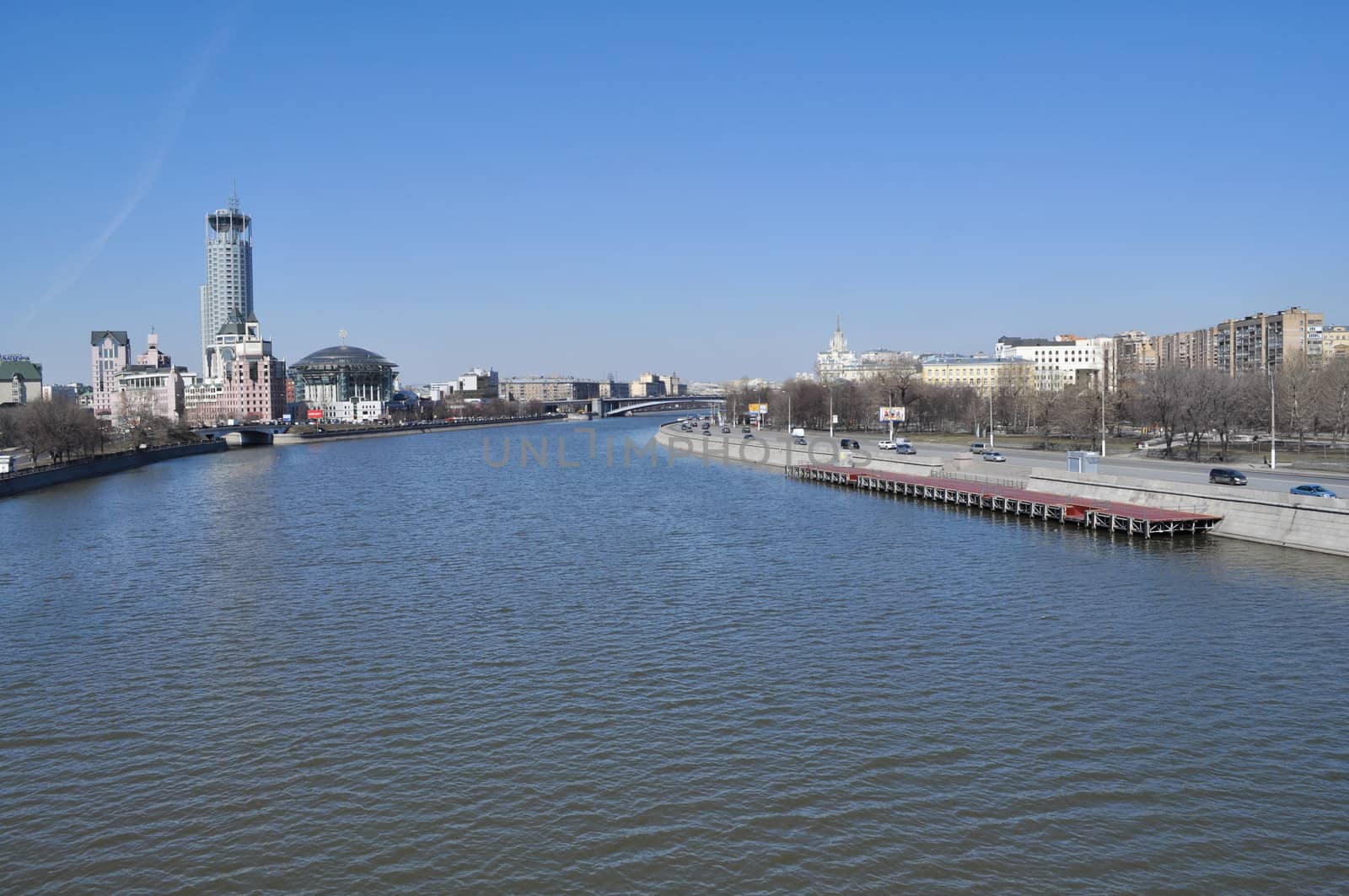 The Moscow quay. April morning. Modern building of the business centre.