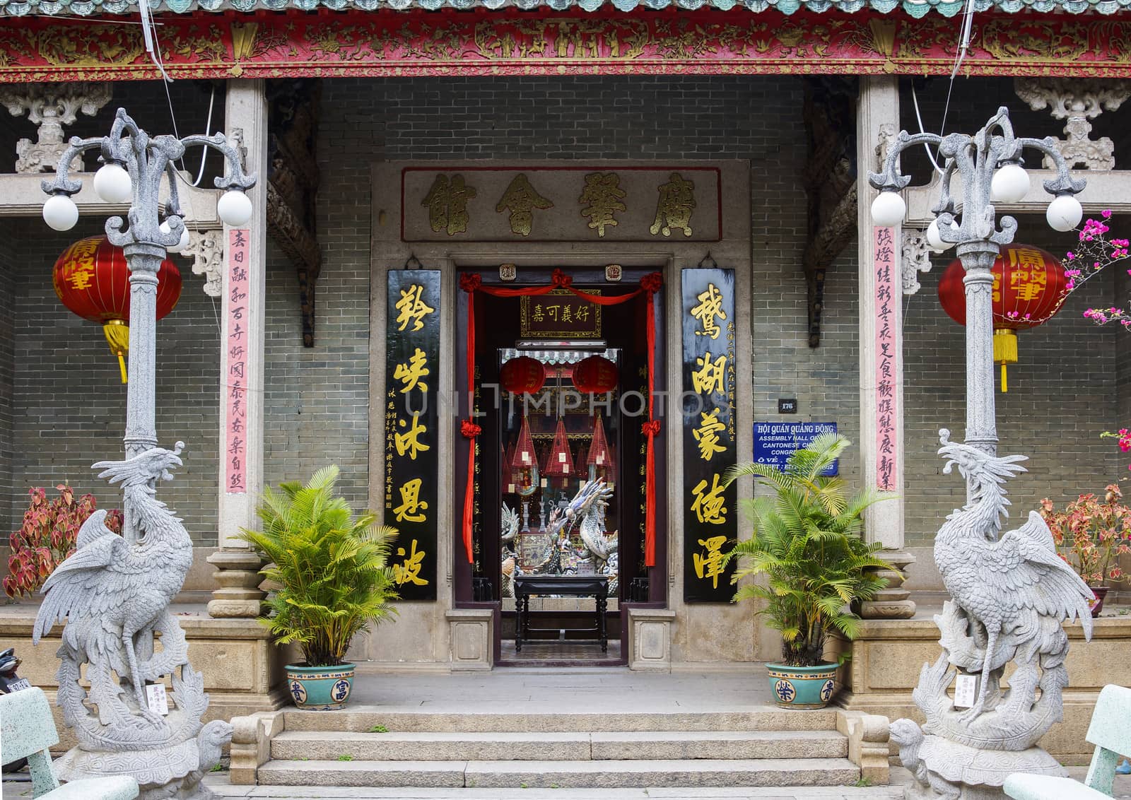 Entrance to the Quang Dong Chinese temple in Hoi An, Vietnam. by Claudine
