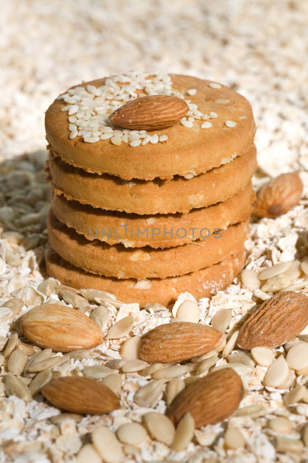 oatmeal cookies  with Fresh ingredients for them (oat flakes, nuts) 