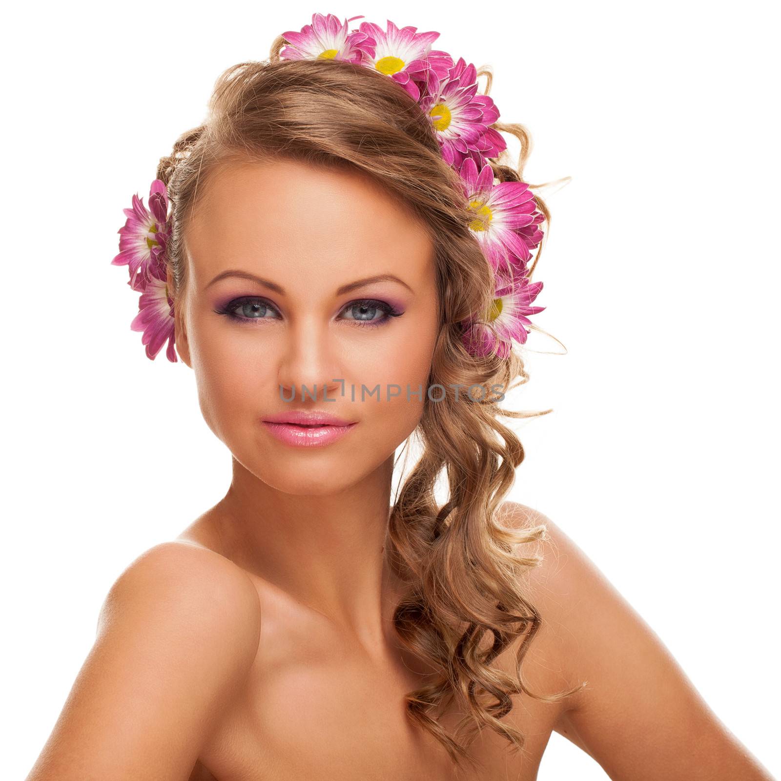 Beautiful young caucasian woman with flowers in her hair isolated over white background