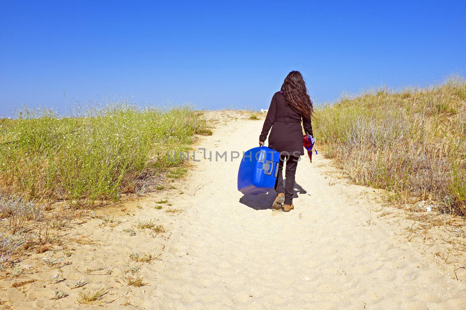 Young woman travelling to her holidays destination by devy