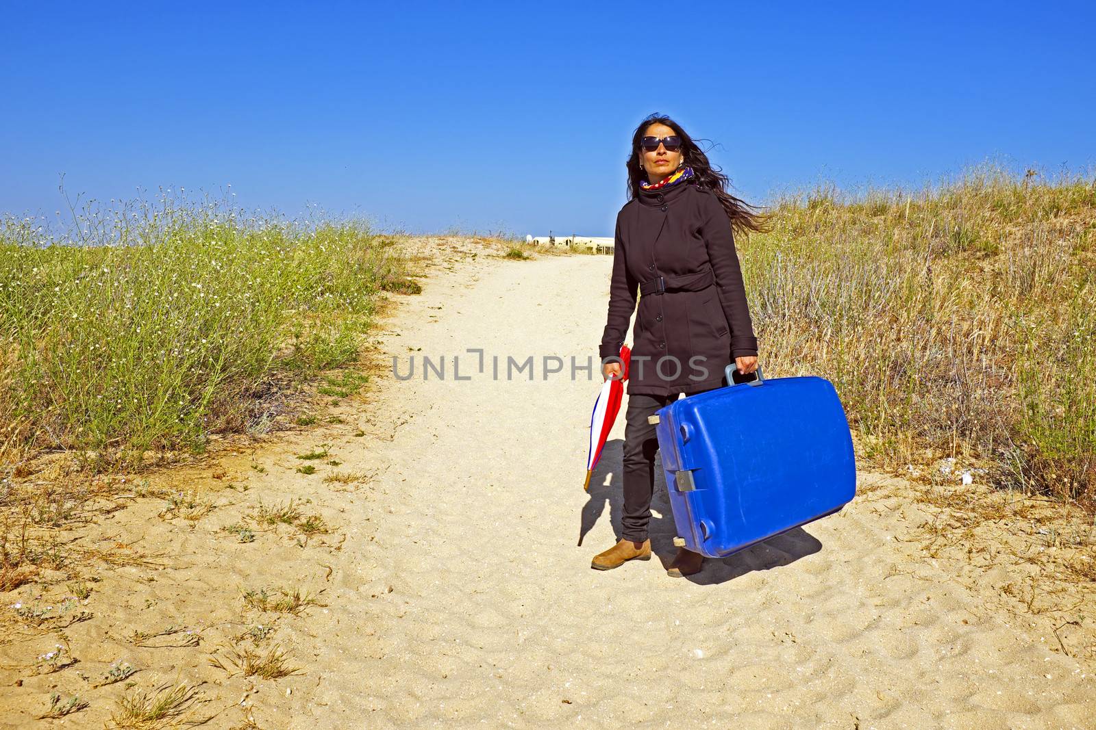 Woman travelling to her holiday destinatination by devy