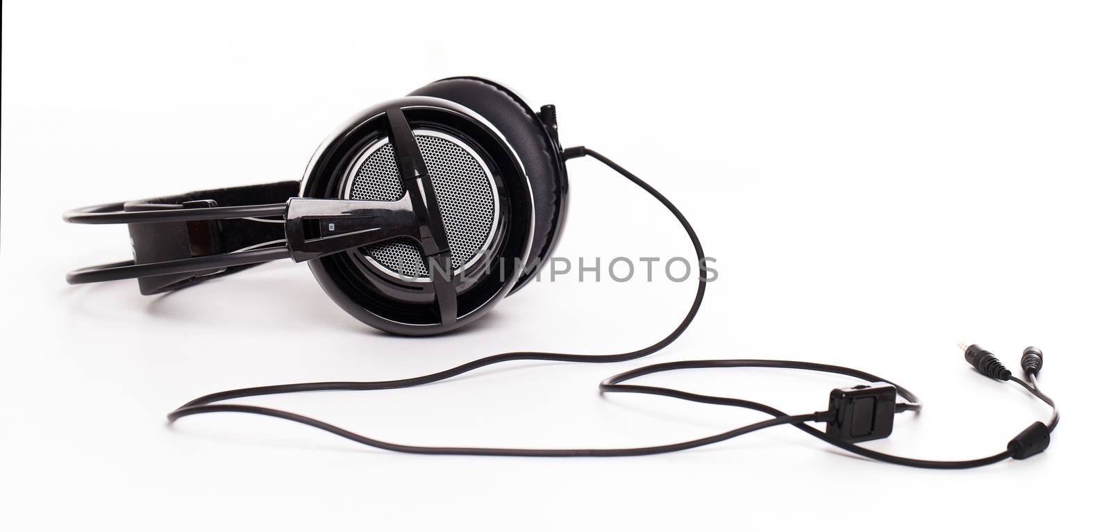 Closeup image of big black headphones by rufatjumali