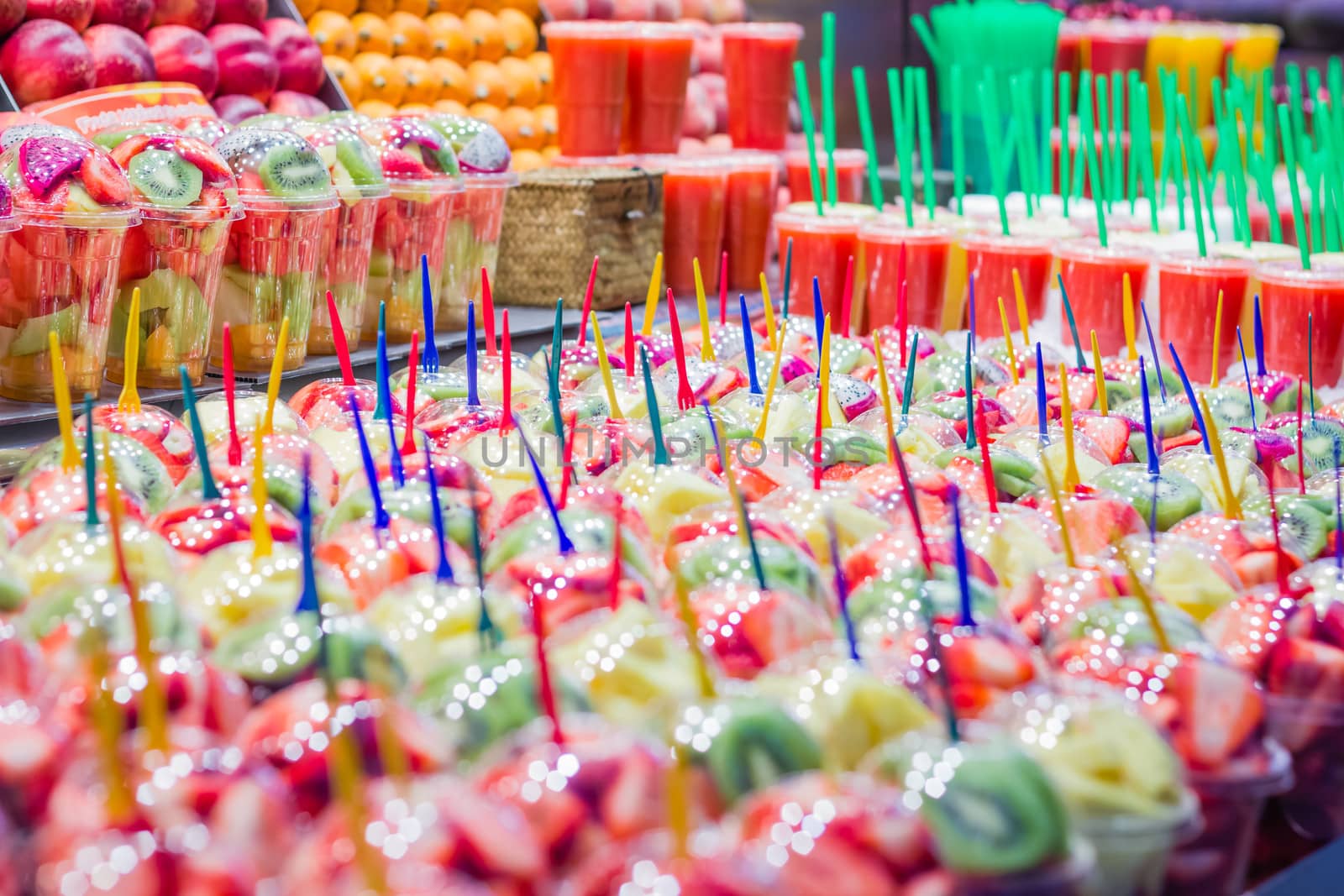 Set packed of fresh fruits and juices in La Boqueria market, in  by doble.d