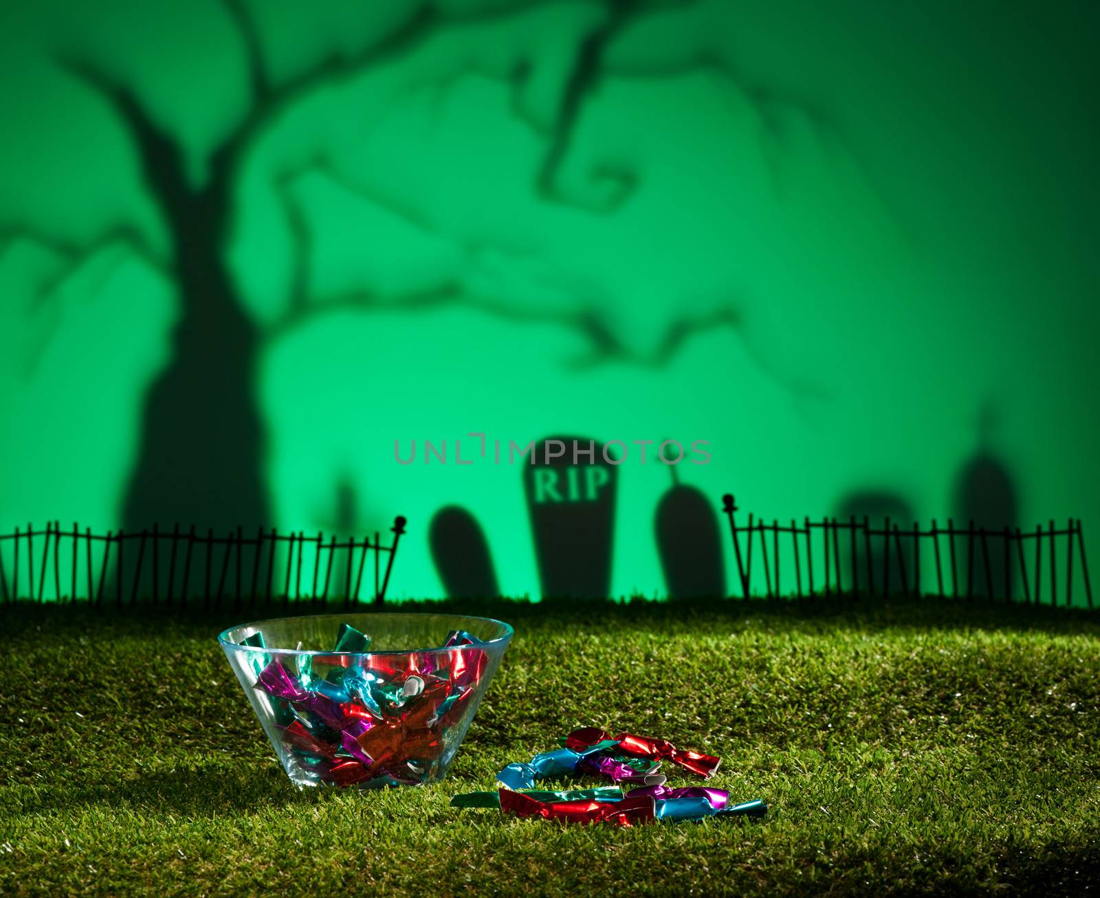 Halloween landscape with tree graveyard and sweets