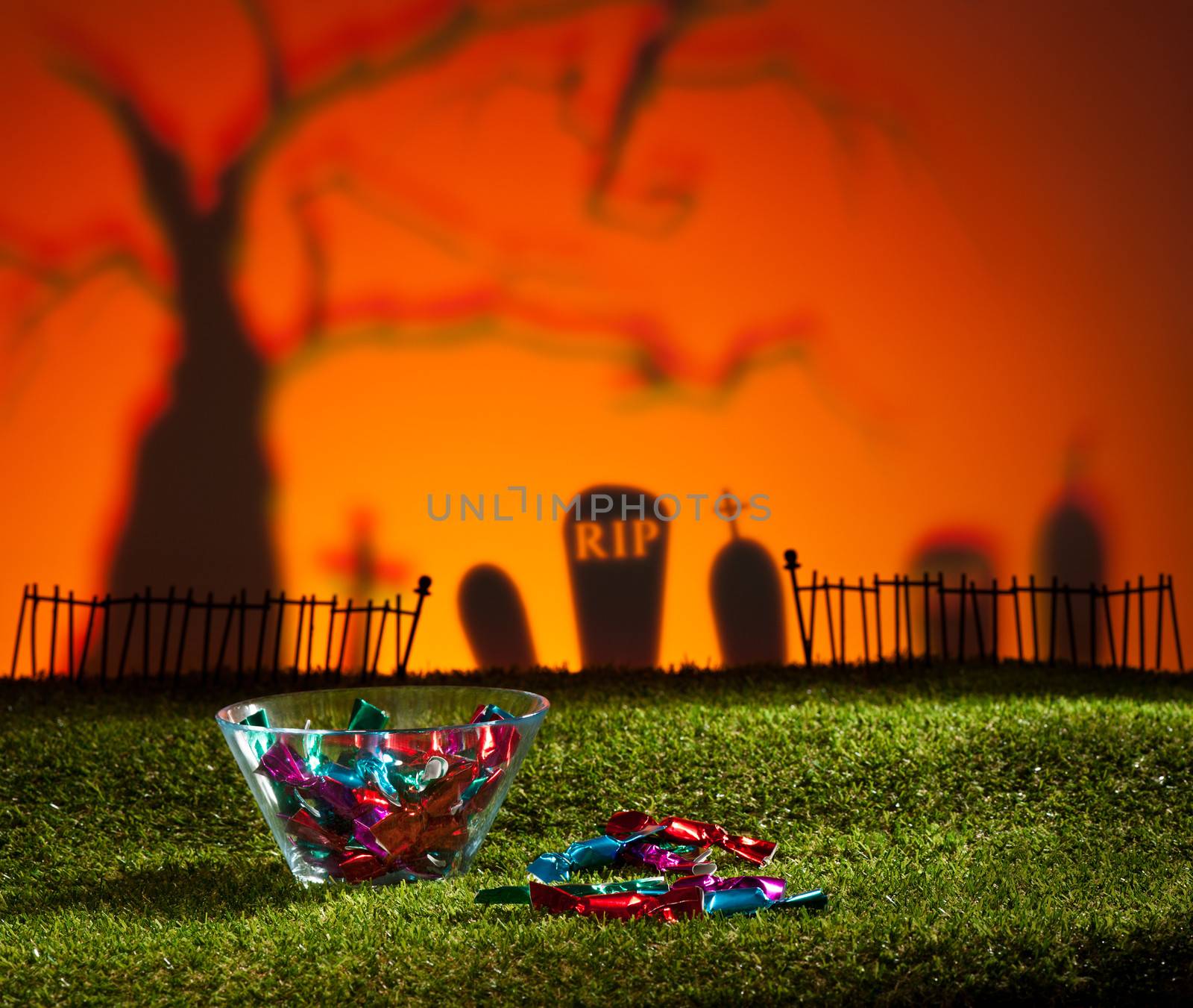 Halloween landscape with tree graveyard and sweets