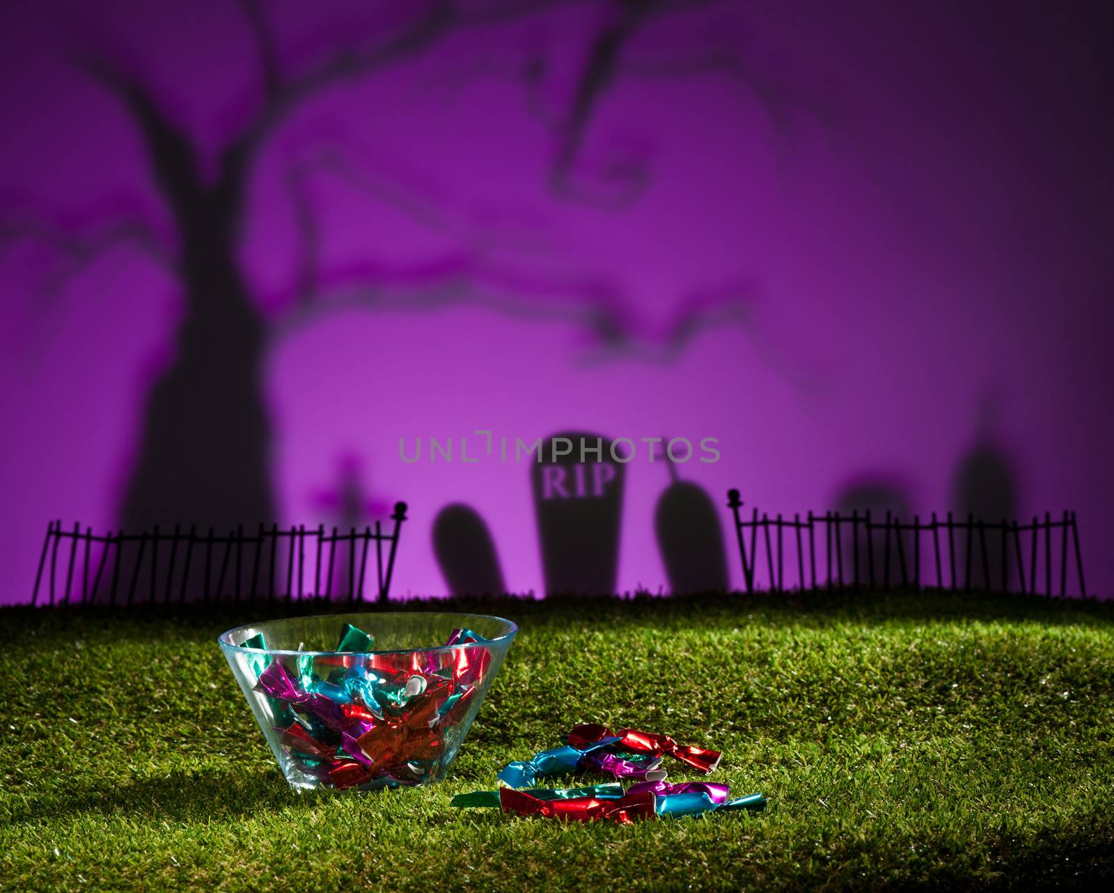 Halloween landscape with tree graveyard and sweets