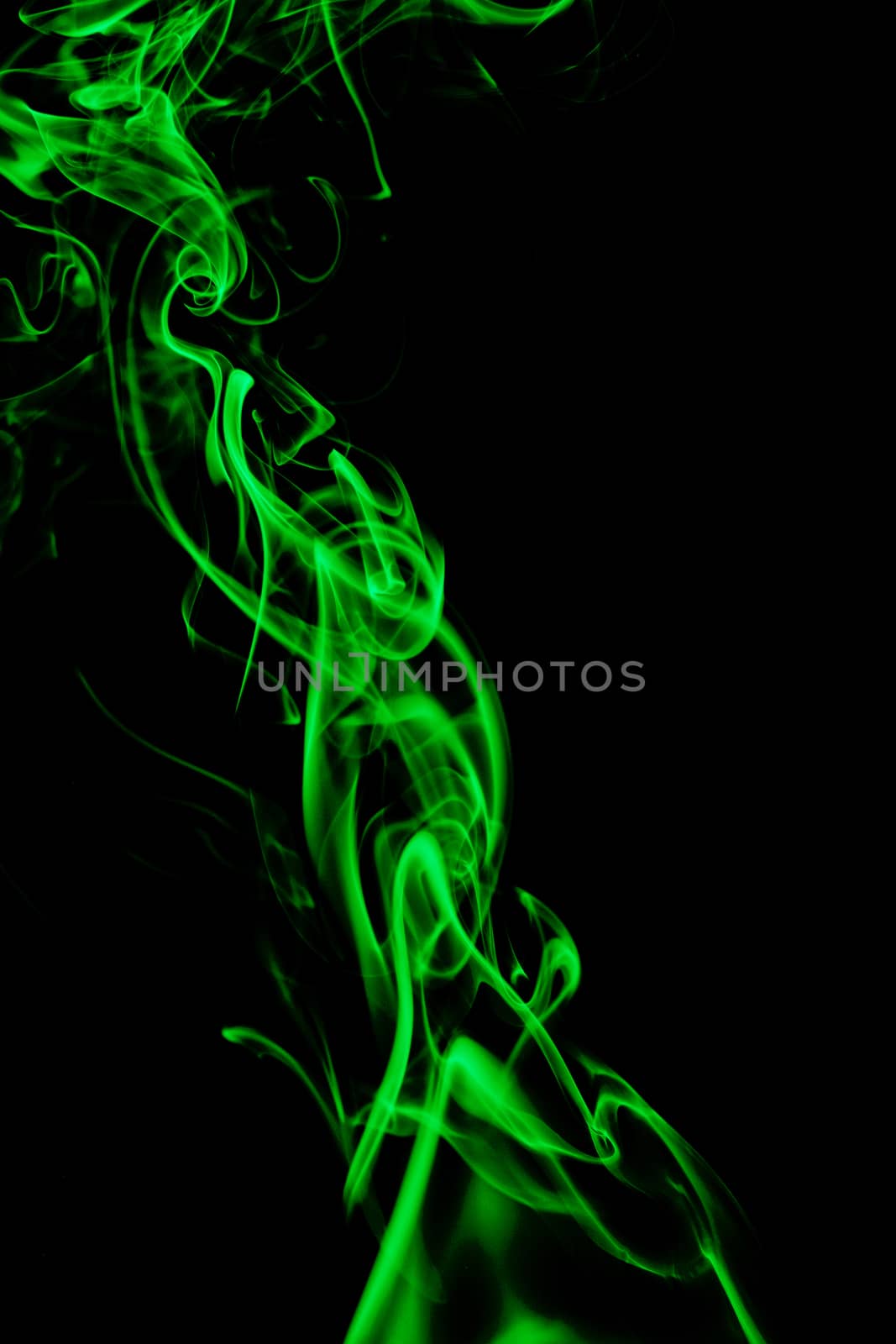 green smoke in black backgroun