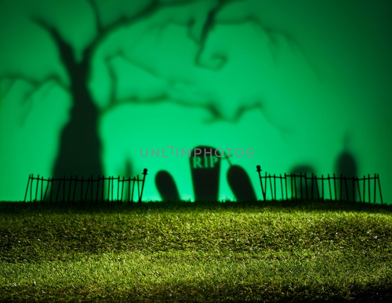 Halloween colorful landscape with tree and graveyard