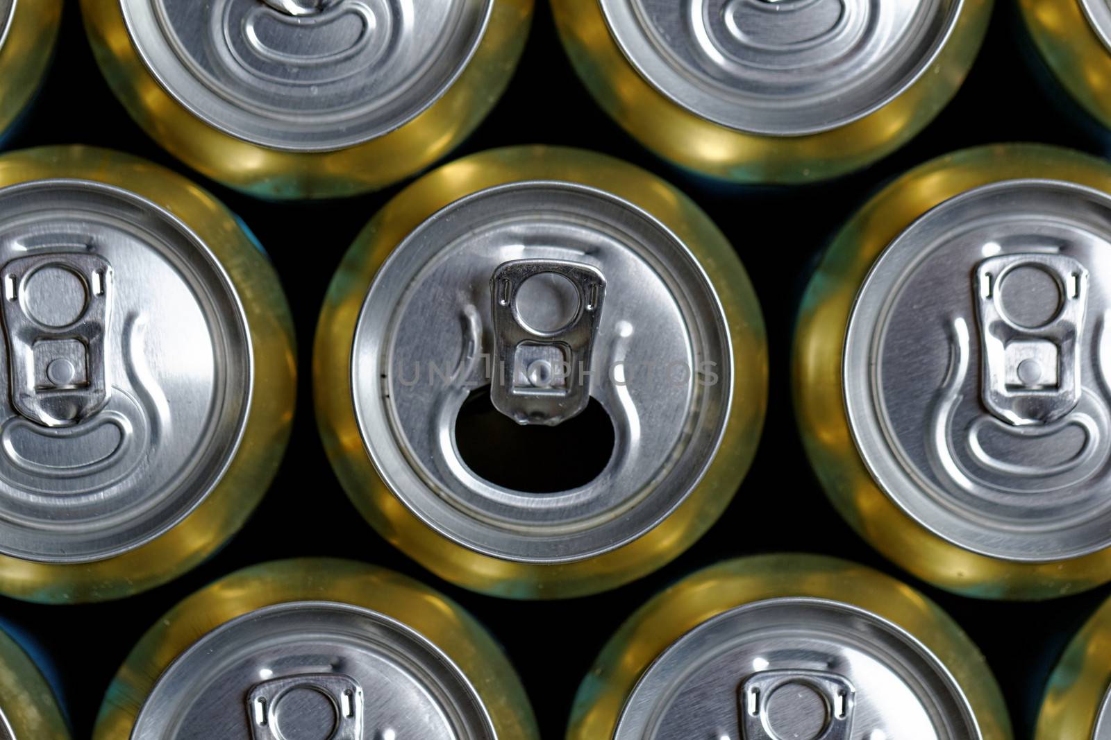 Much of drinking cans close up, one is open