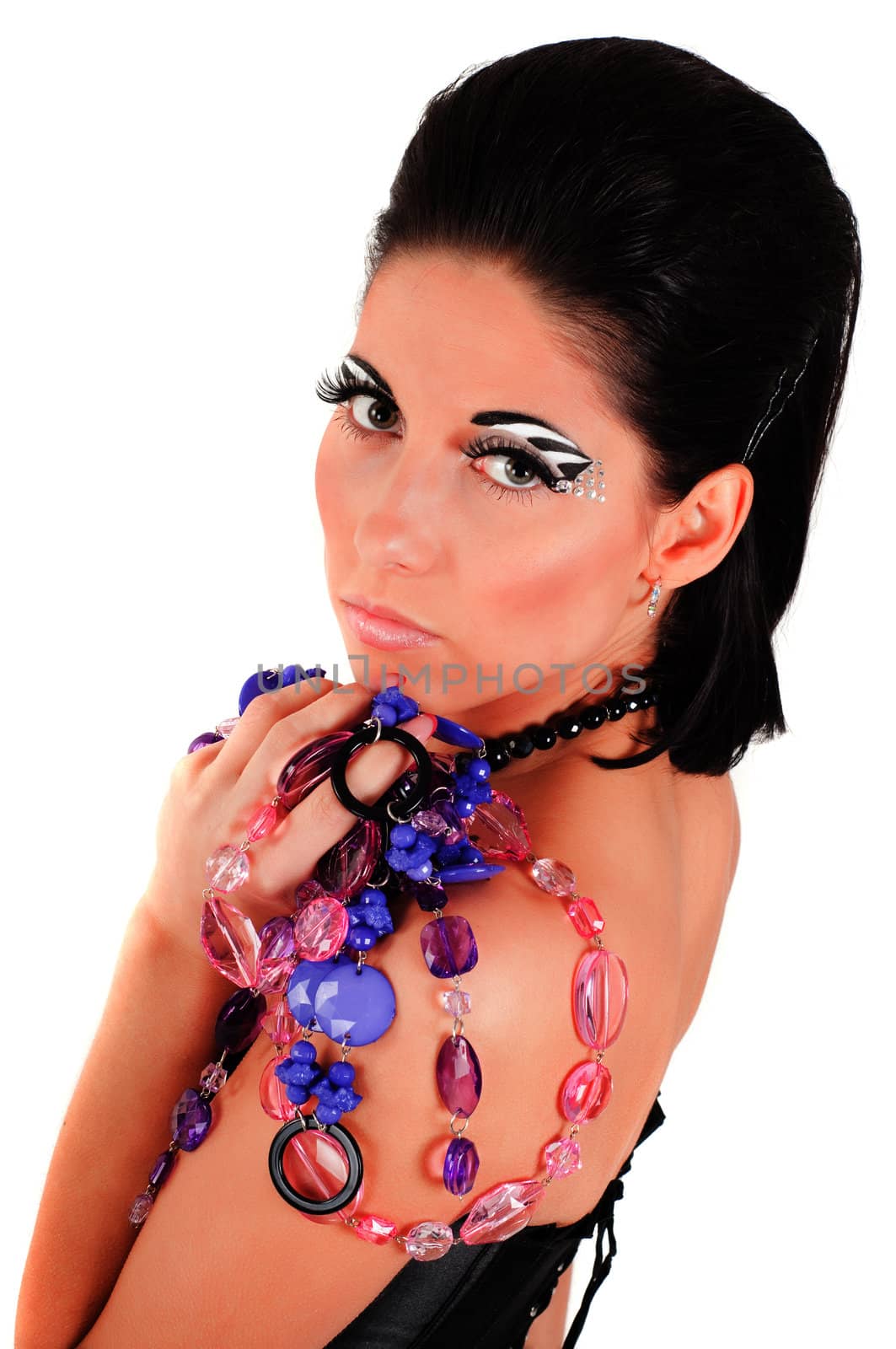 Closeup fashion shoot of woman with color face art