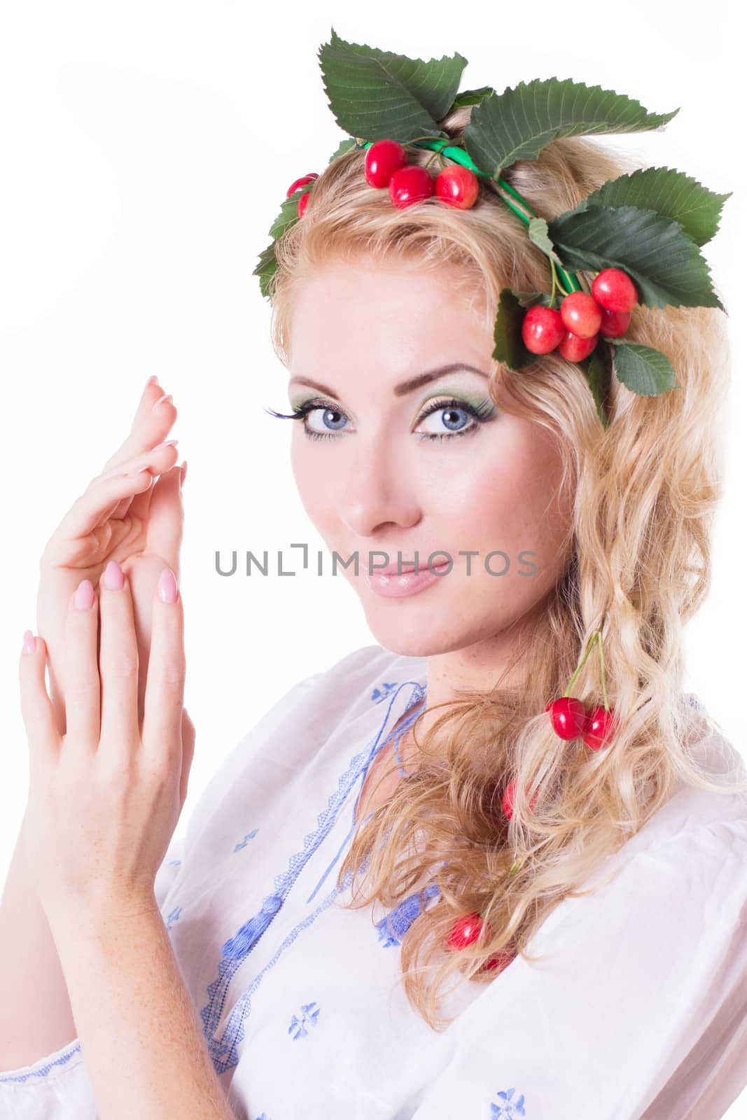 Russian sensual woman with wreath from cherry and leaves over white