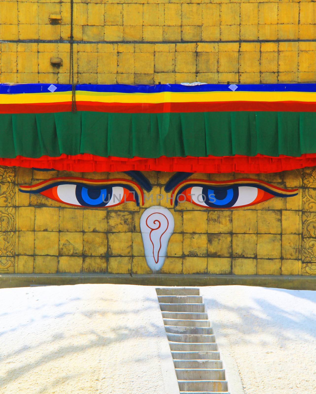 Close up of widsom eyes of Boudhanath Stupa with in Kathmandu, N by nuchylee