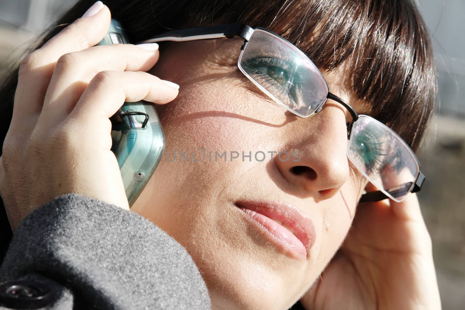 A business woman talking on the cell phone.