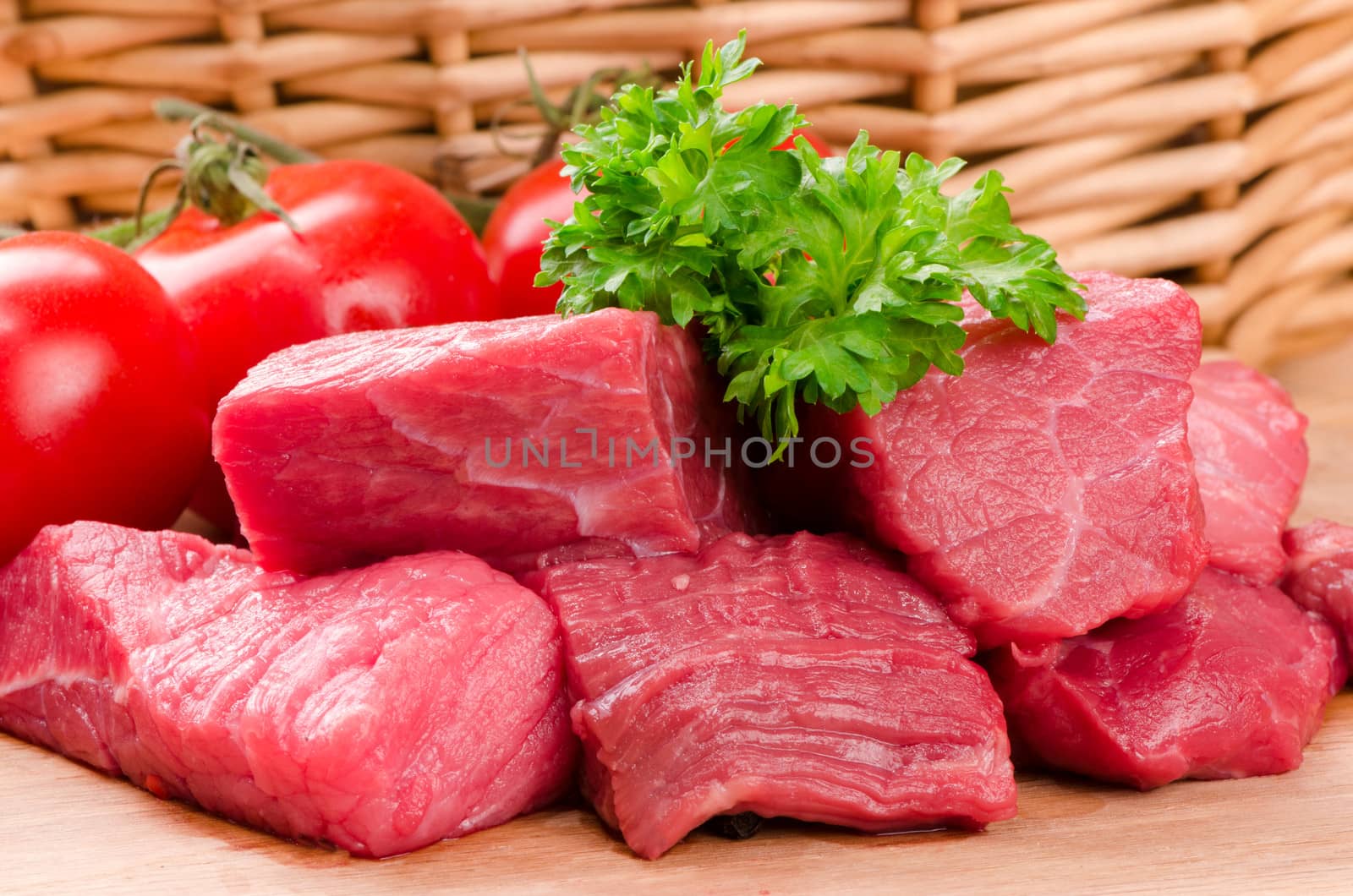 fresh raw meat on wooden board