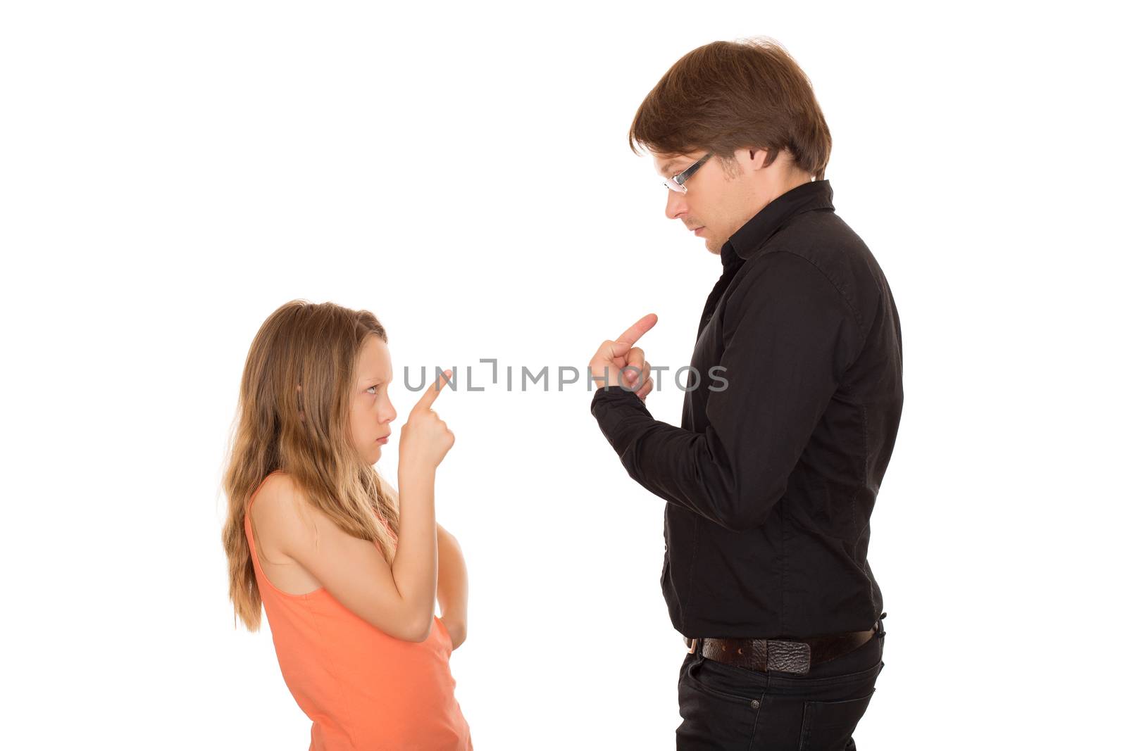 Young girl attack her father by pointing her finger. Conflict between generations. Isolated on white background.