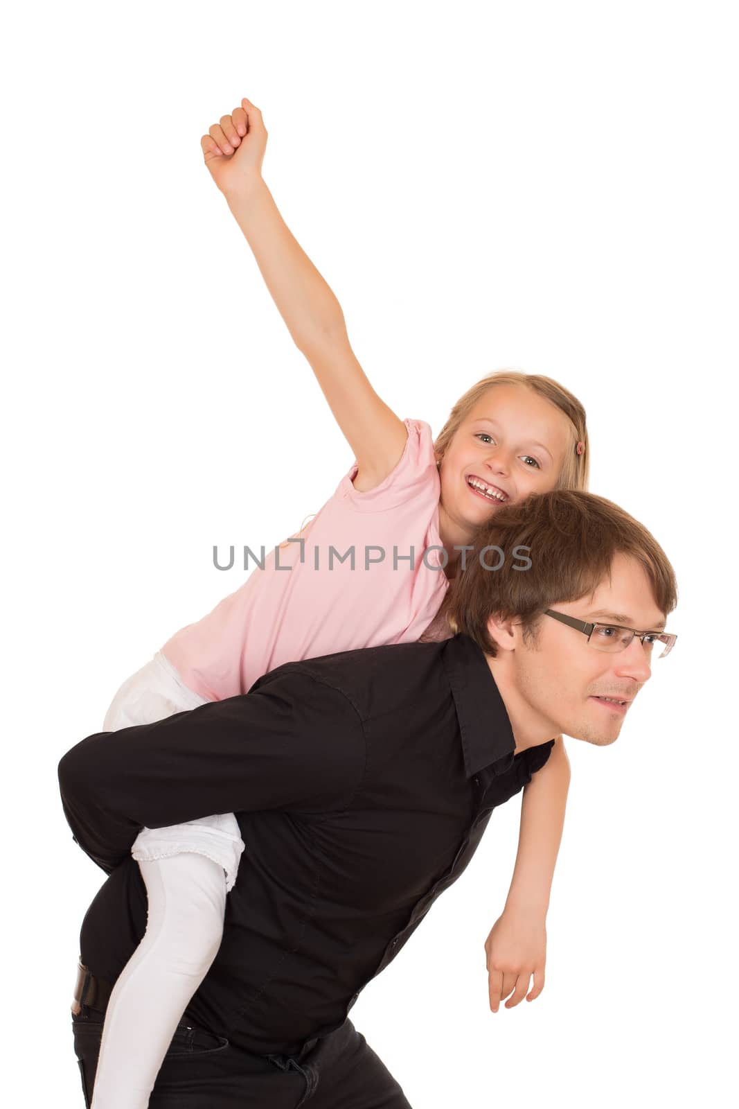Father giving piggyback ride to his daughter which raises her hand to the sky. Isolated on white background.