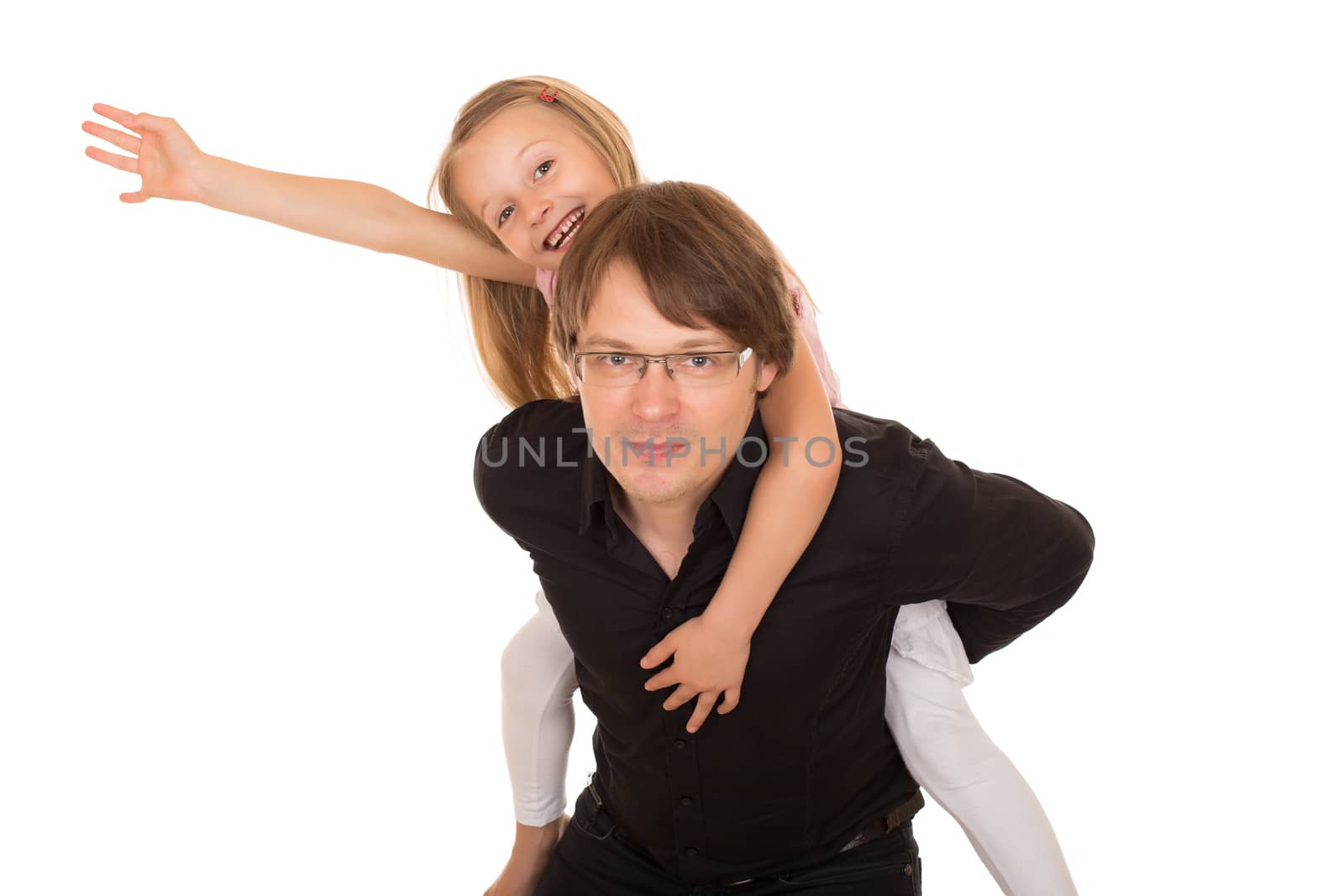 Man giving piggyback ride to a little girl which raises her hand to the sky. Isolated on white background.