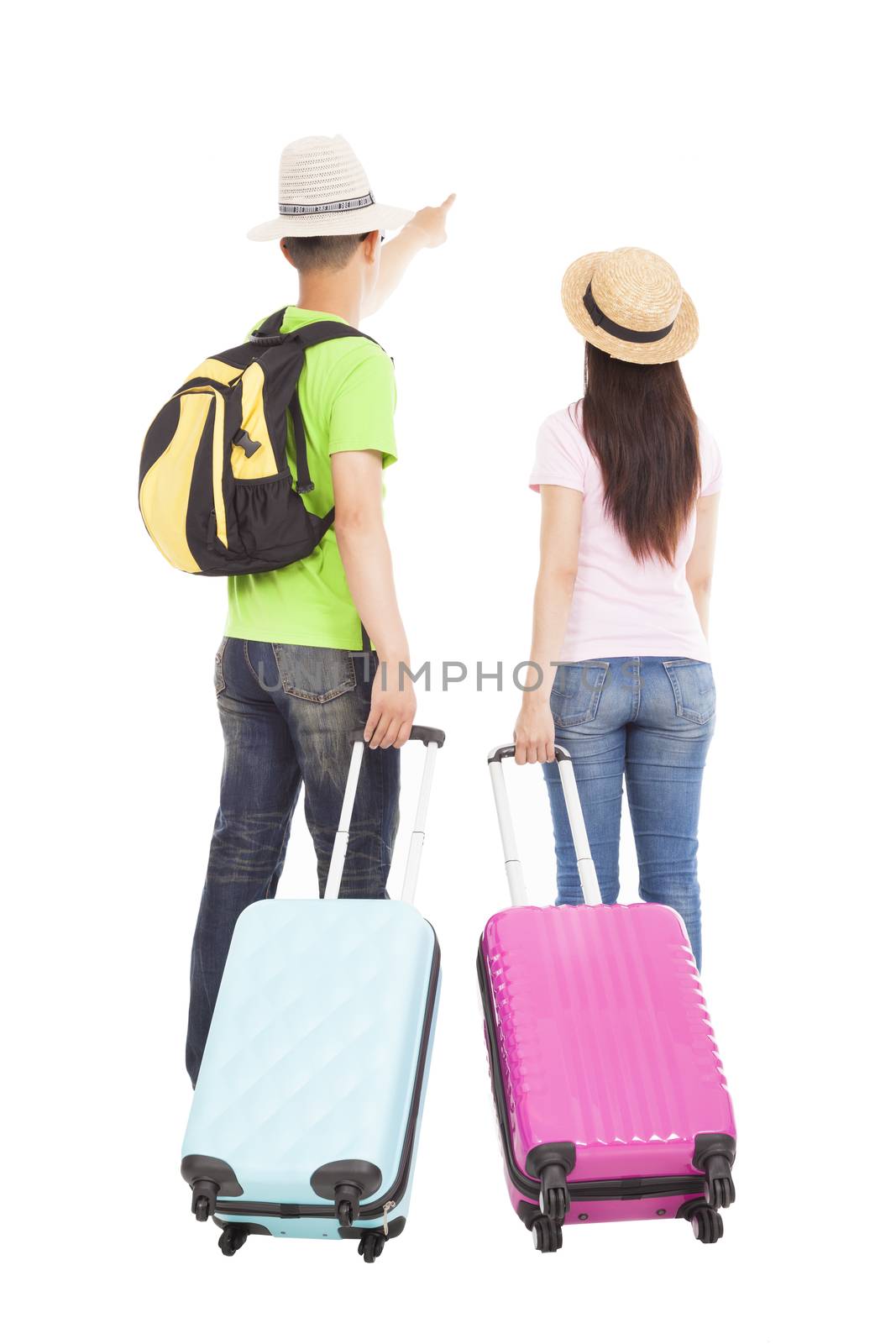 young couple tourist with travel suitcase and pointing something by tomwang