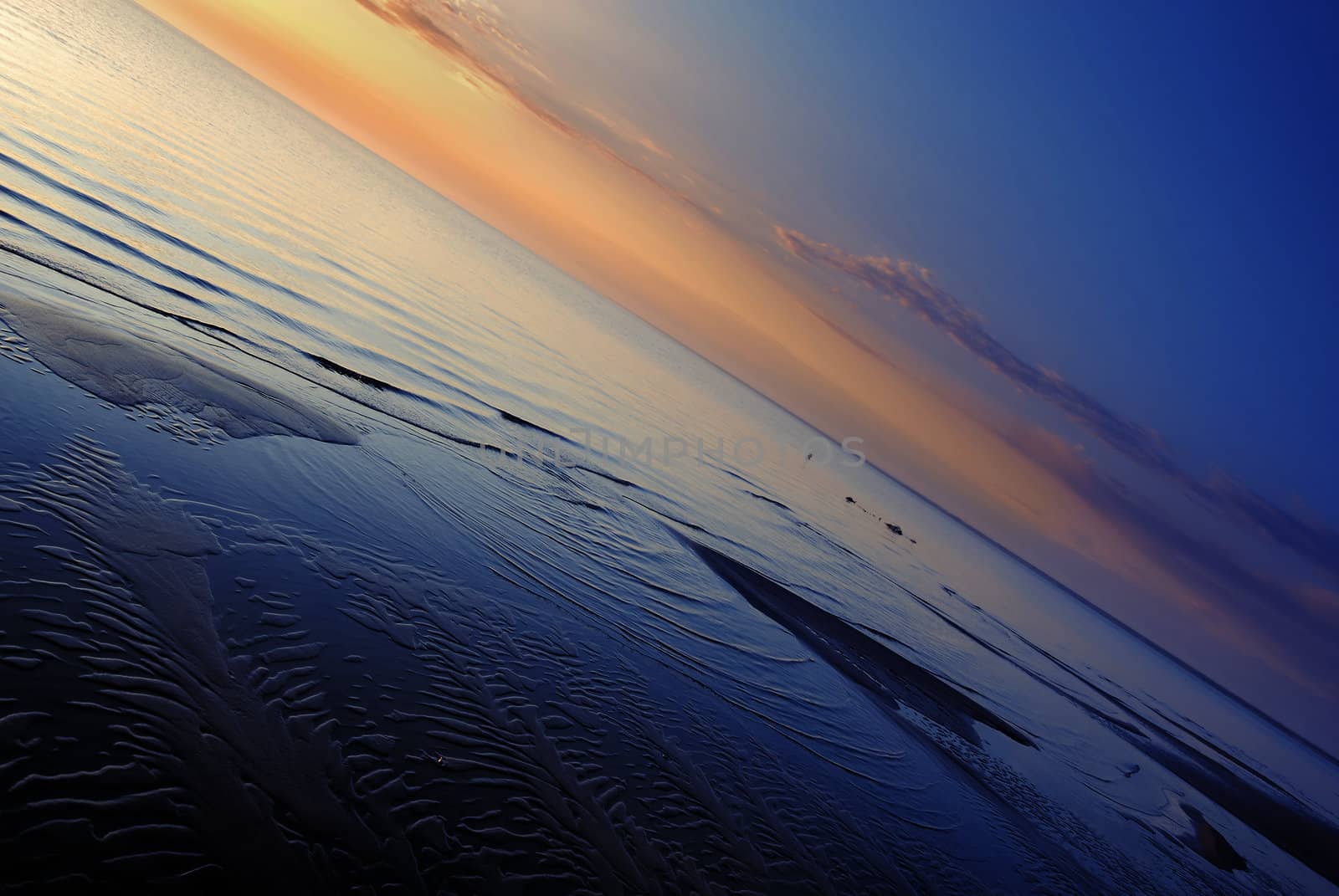 Colorful photo of the sea coastline during sunrise