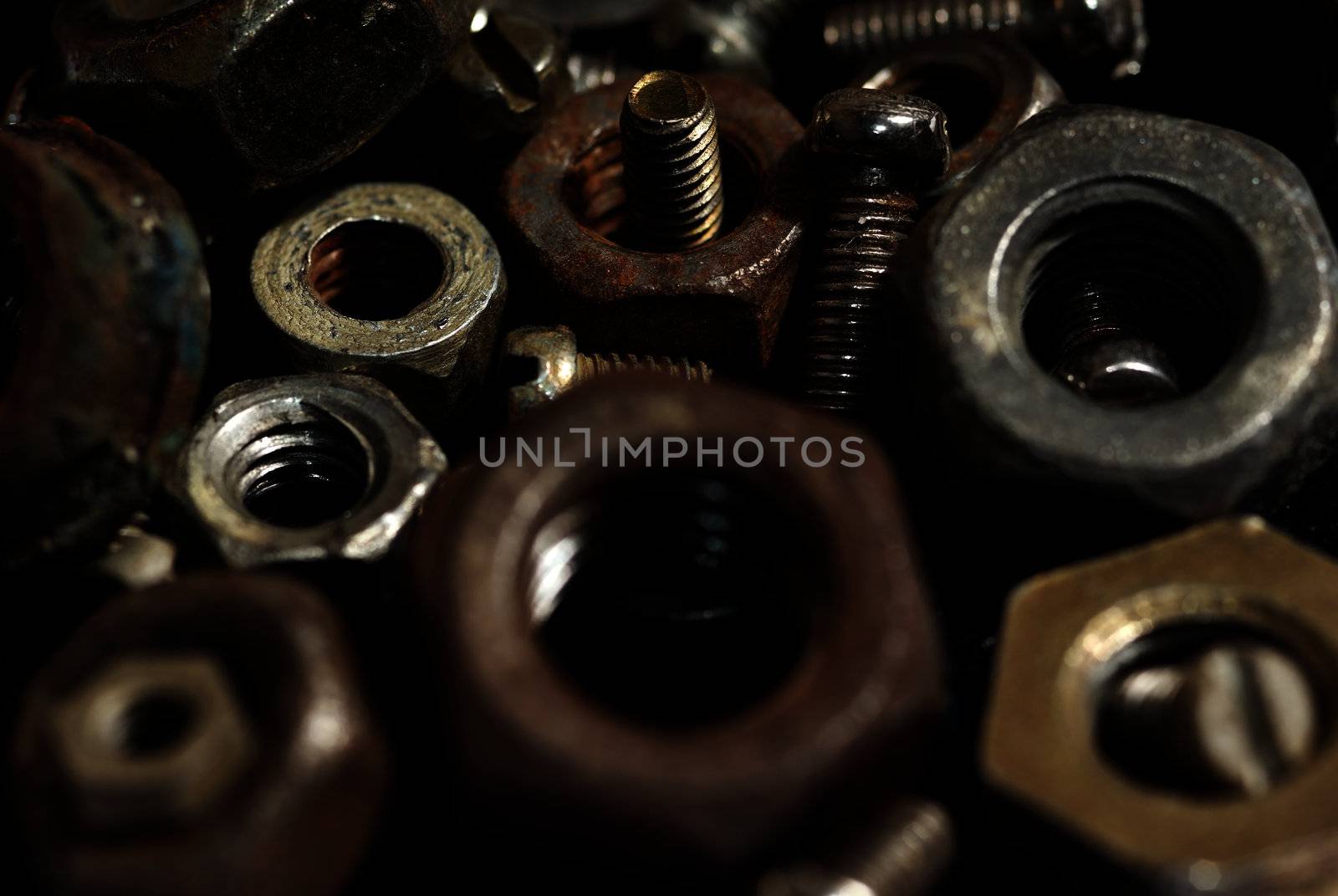 Close-up photo of the numerous rusty screws and hardware