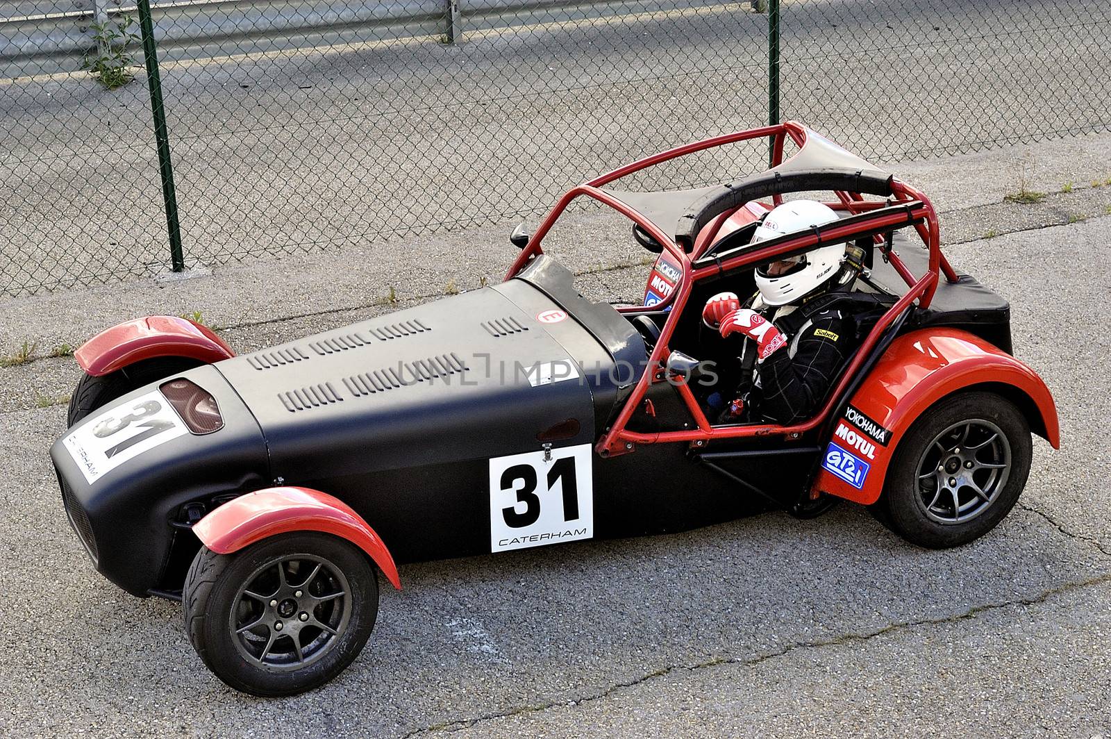 chases of Caterham on the circuit of the Cevennes with Ales in the French department of Gard the May 24th and 25th, 2013. on the starting line before the race