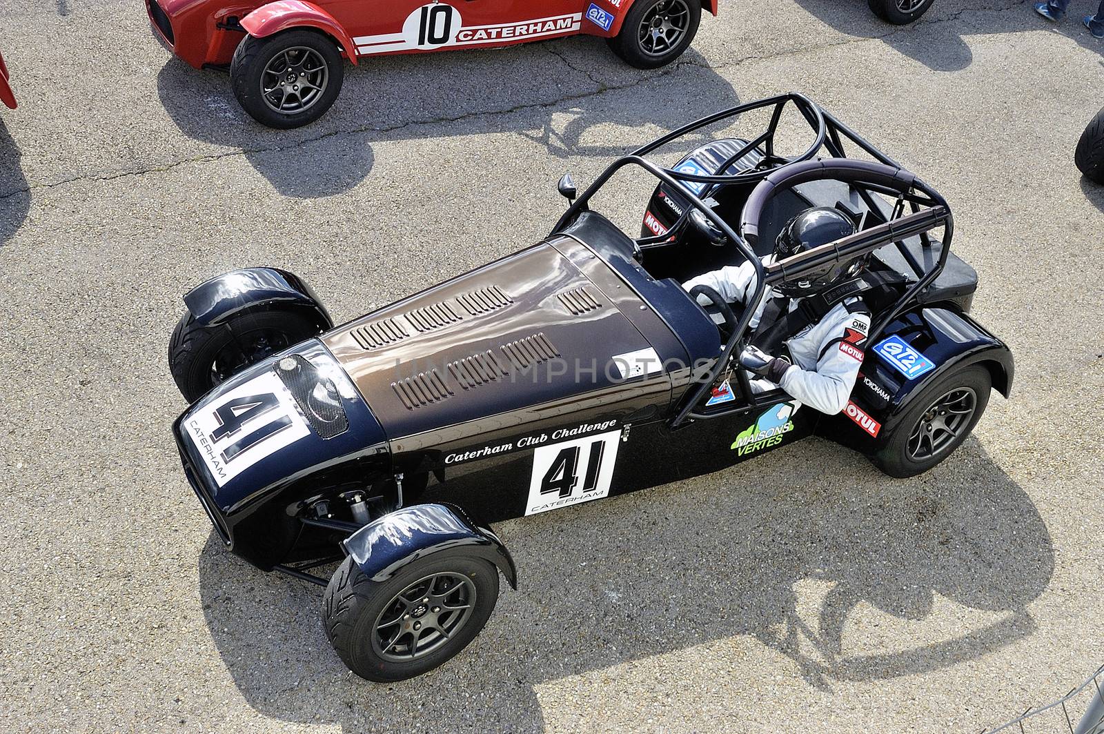 chases of Caterham on the circuit of the Cevennes with Ales in the French department of Gard the May 24th and 25th, 2013. on the starting line before the race