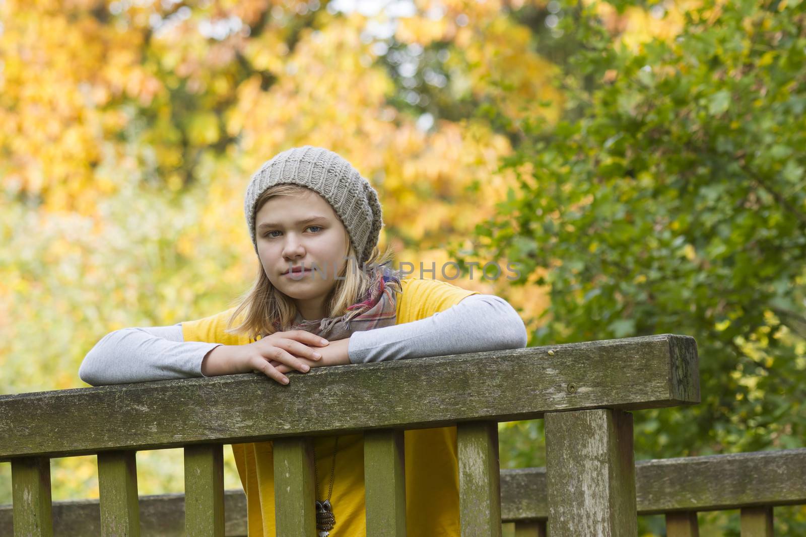 cute little girl in the autumn park by miradrozdowski