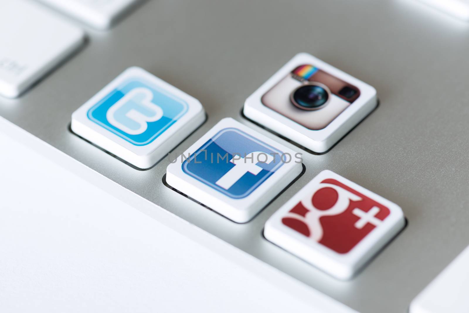 Kiev, Ukraine - May 20, 2013 - A social media icons of Facebook, Twitter, Google Plus and Instagram placed on computer keyboard keys.