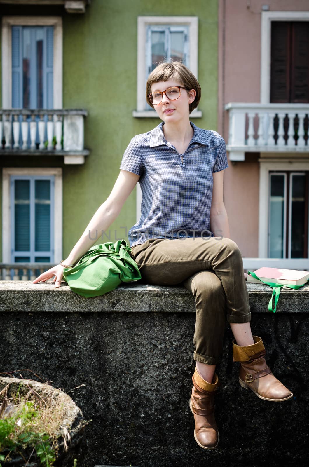 young beautiful hipster woman in the city