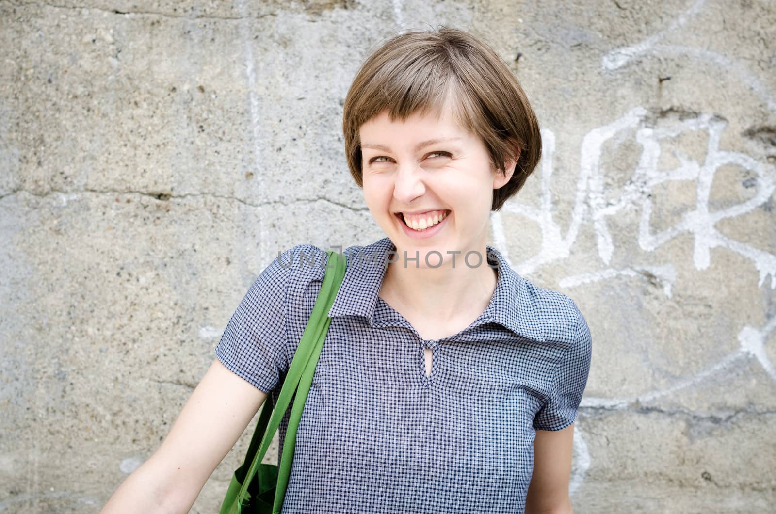 young beautiful hipster woman in the city